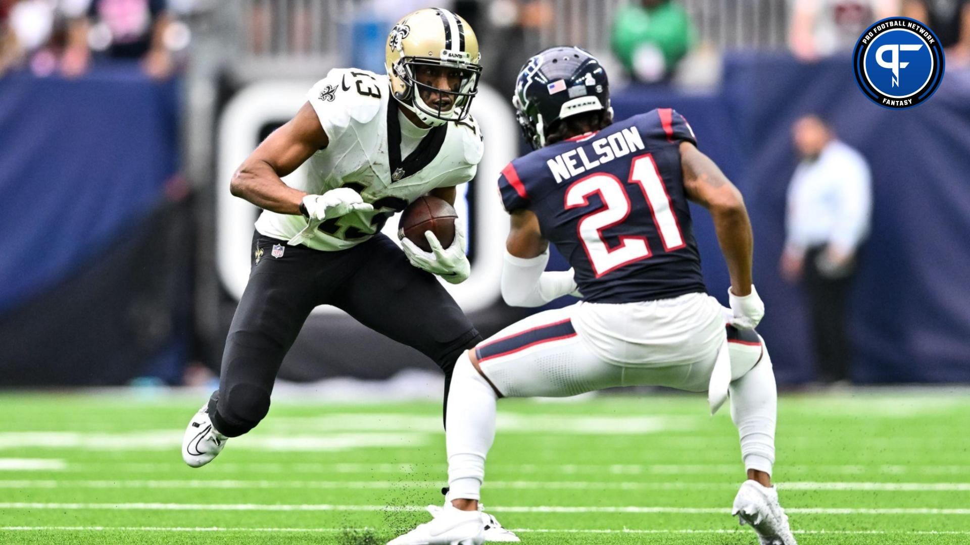 New Orleans Saints wide receiver Michael Thomas (13) catches a pass as Houston Texans cornerback Steven Nelson (21) defends during the fourth quarter at NRG Stadium.