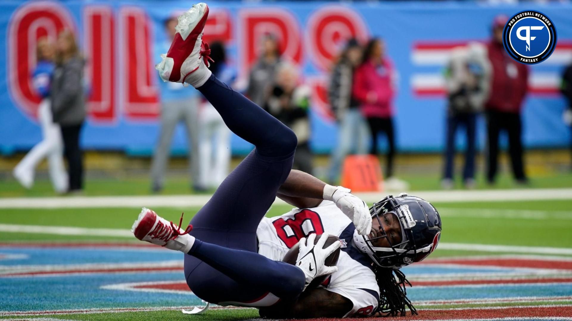 Houston Texans wide receiver Noah Brown (85) lands in the end zone for a touchdown against the Tennessee Titans during the fourth quarter at Nissan Stadium in Nashville, Tenn., Sunday, Dec. 17, 2023.