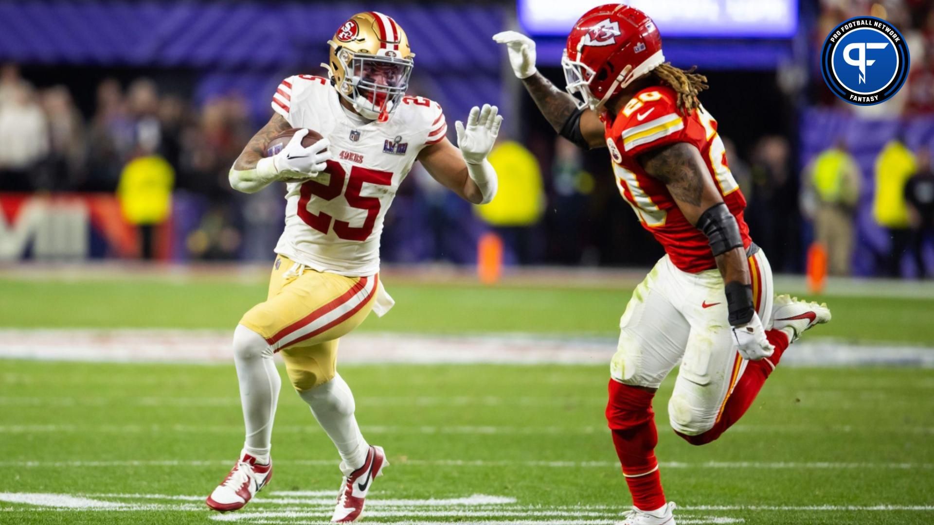 San Francisco 49ers running back Elijah Mitchell (25) against Kansas City Chiefs safety Justin Reid (20) in Super Bowl LVIII at Allegiant Stadium.