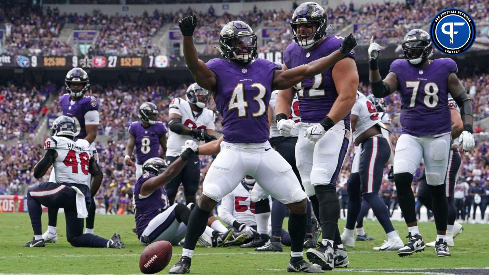 Baltimore Ravens running back Justice Hill (43) reacts after running for his second touchdown of the third quarter against the Houston Texans at M&T Bank Stadium.