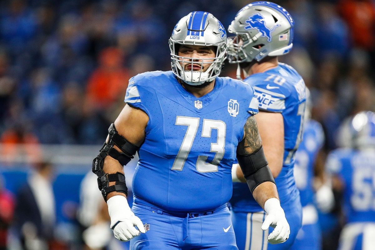 Detroit Lions guard Jonah Jackson warms up before the Denver Broncos game at Ford Field.