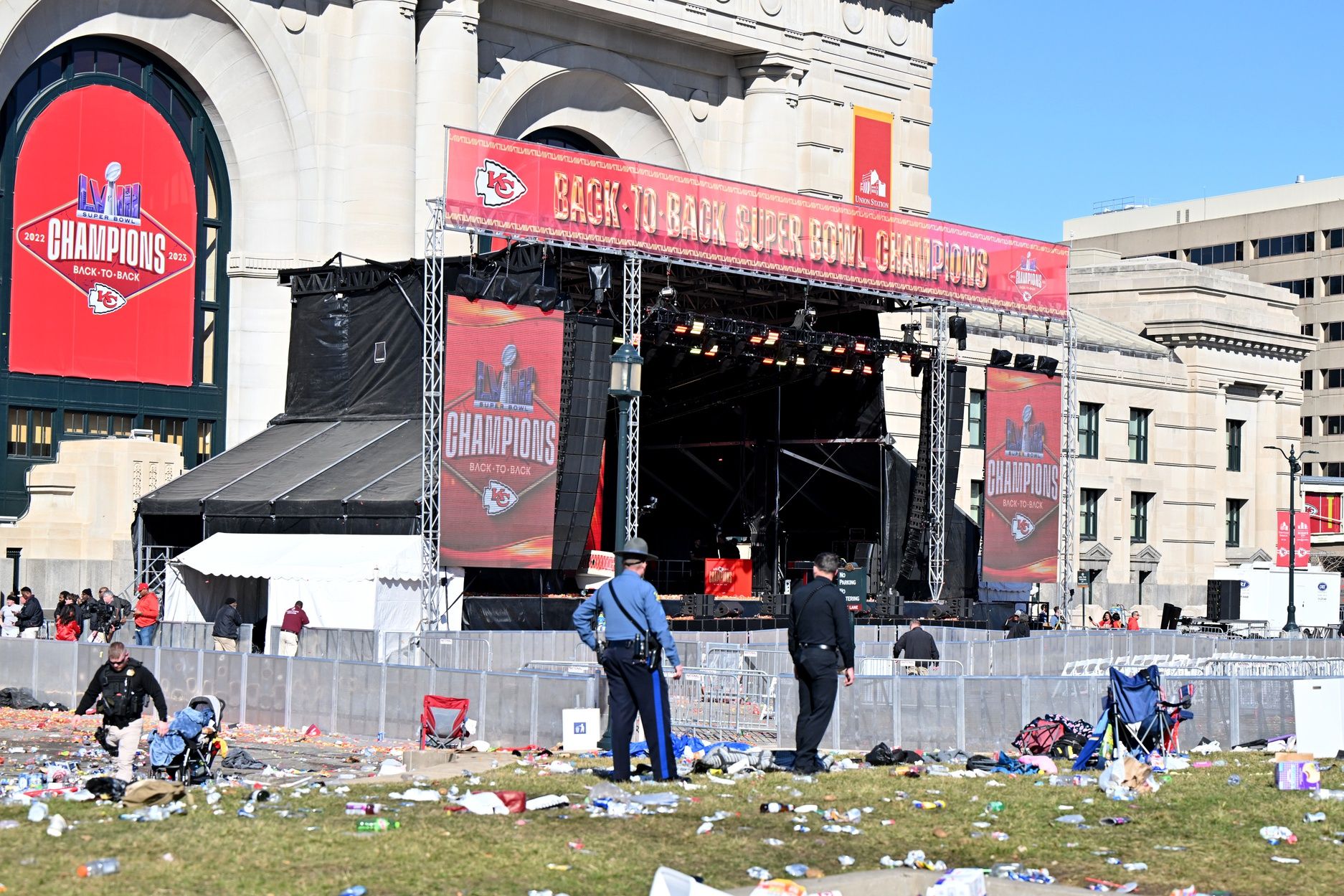 Police clear the area after shots were fired after the celebration of the Kansas City Chiefs winning Super Bowl LVIII.