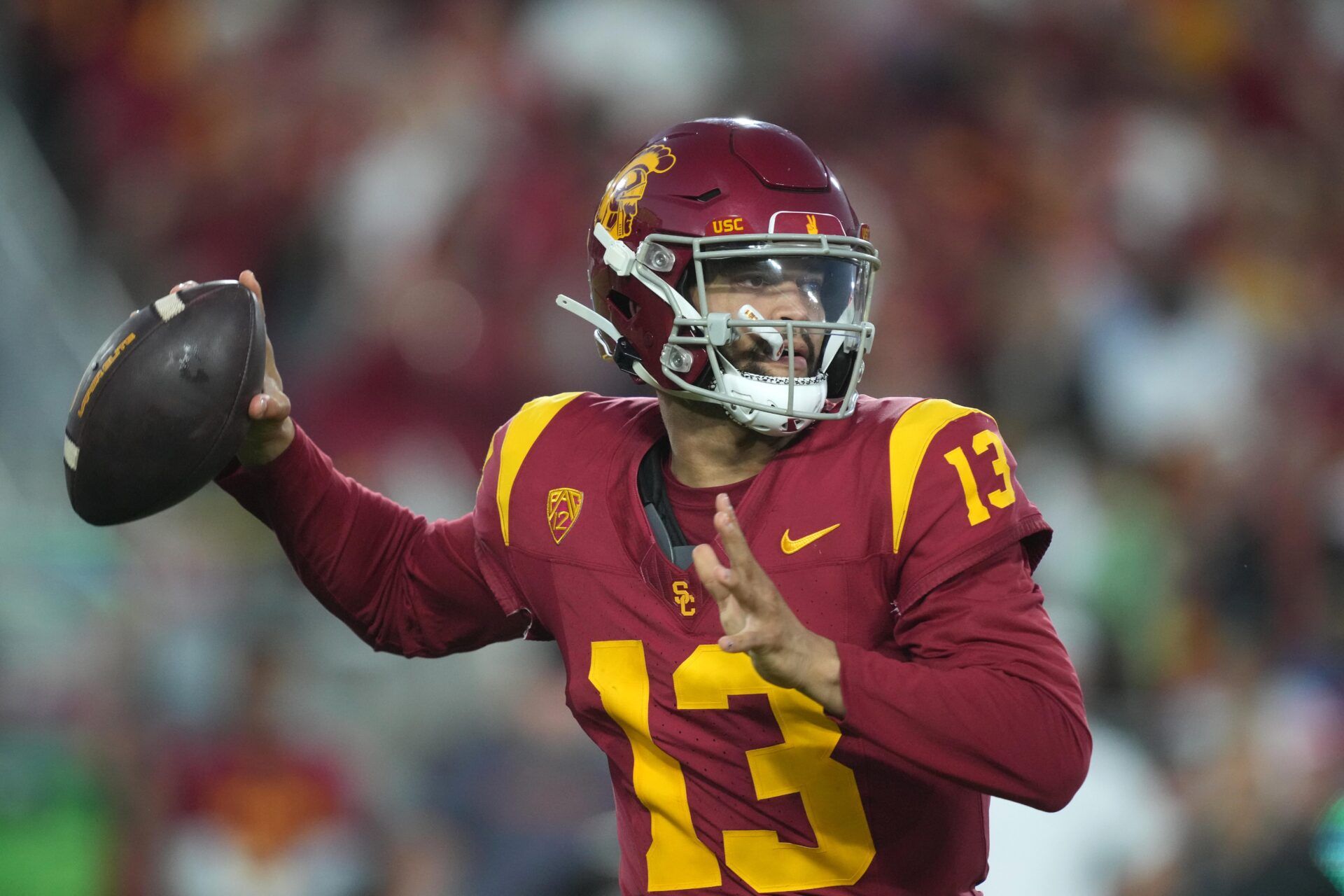 Southern California Trojans quarterback Caleb Williams (13) throws the ball against the Utah Utes in the first half at United Airlines Field at Los Angeles Memorial Coliseum.