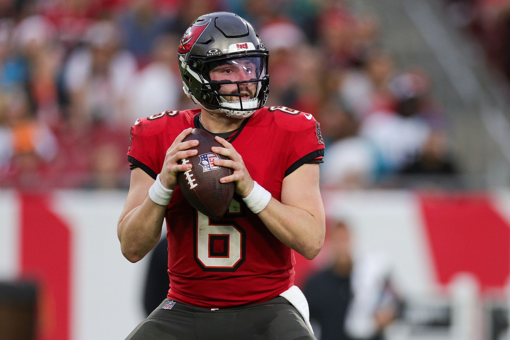 Tampa Bay Buccaneers quarterback Baker Mayfield (6) drops back to pass against the Jacksonville Jaguars.