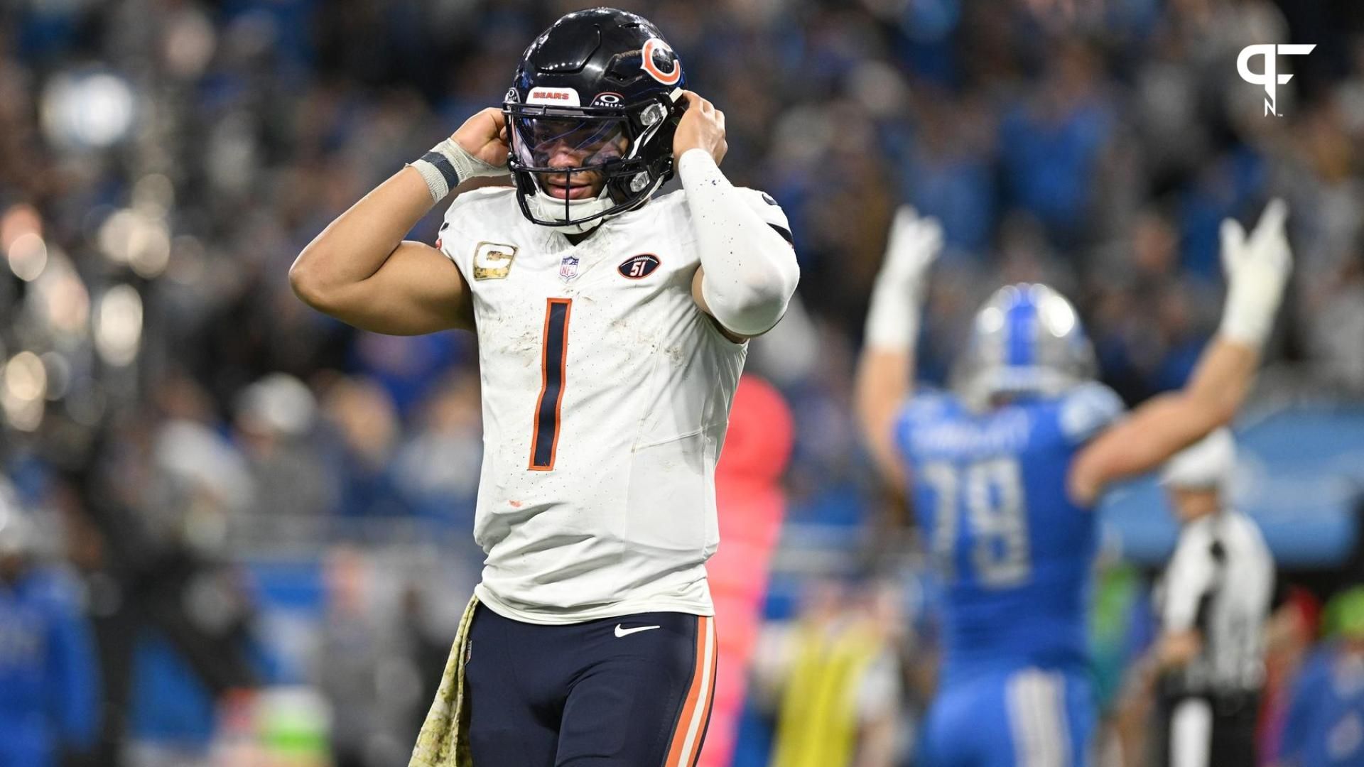 Chicago Bears QB Justin Fields (1) walks off the field against the Detroit Lions.