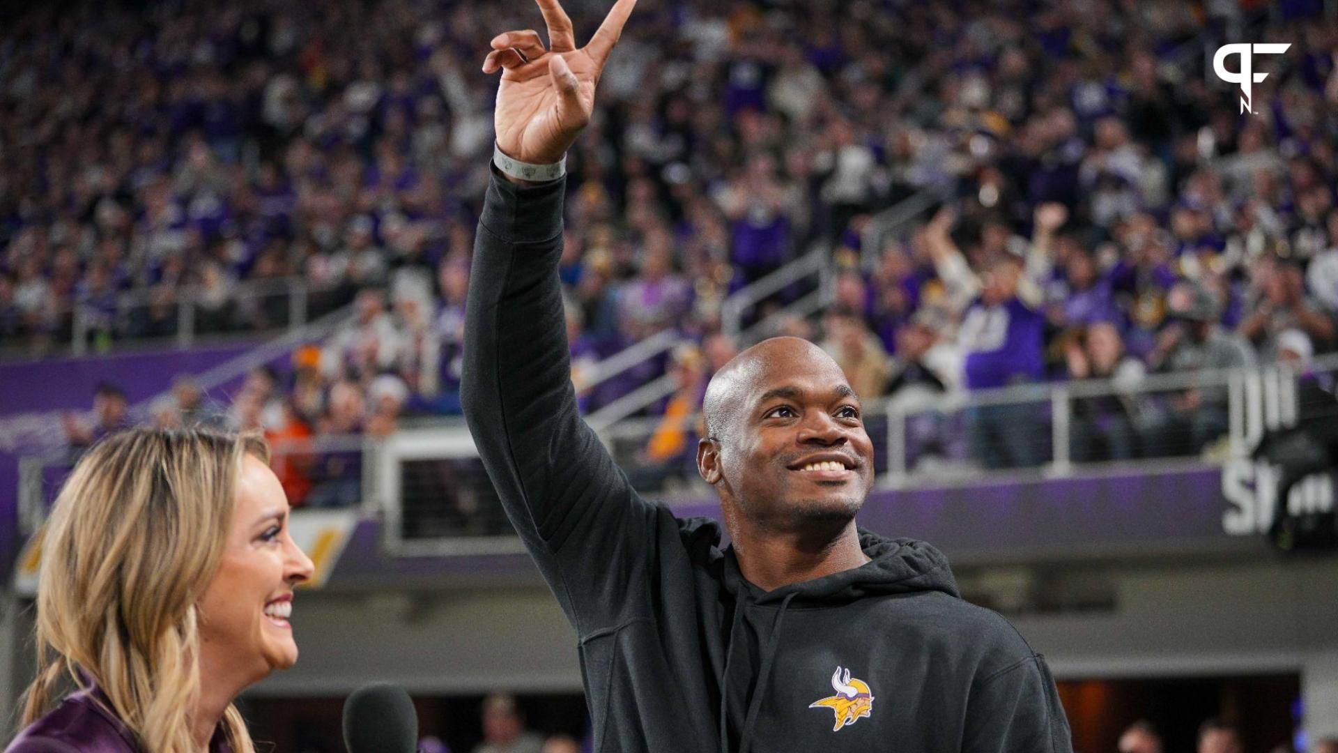 Ex Minnesota Viking Adrian Peterson salutes the crowd in the third quarter in a game against the Chicago Bears at U.S. Bank Stadium.