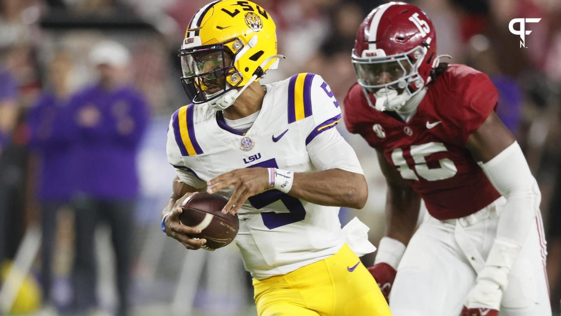 LSU Tigers QB Jayden Daniels (5) runs with the ball against the Alabama Crimson Tide.