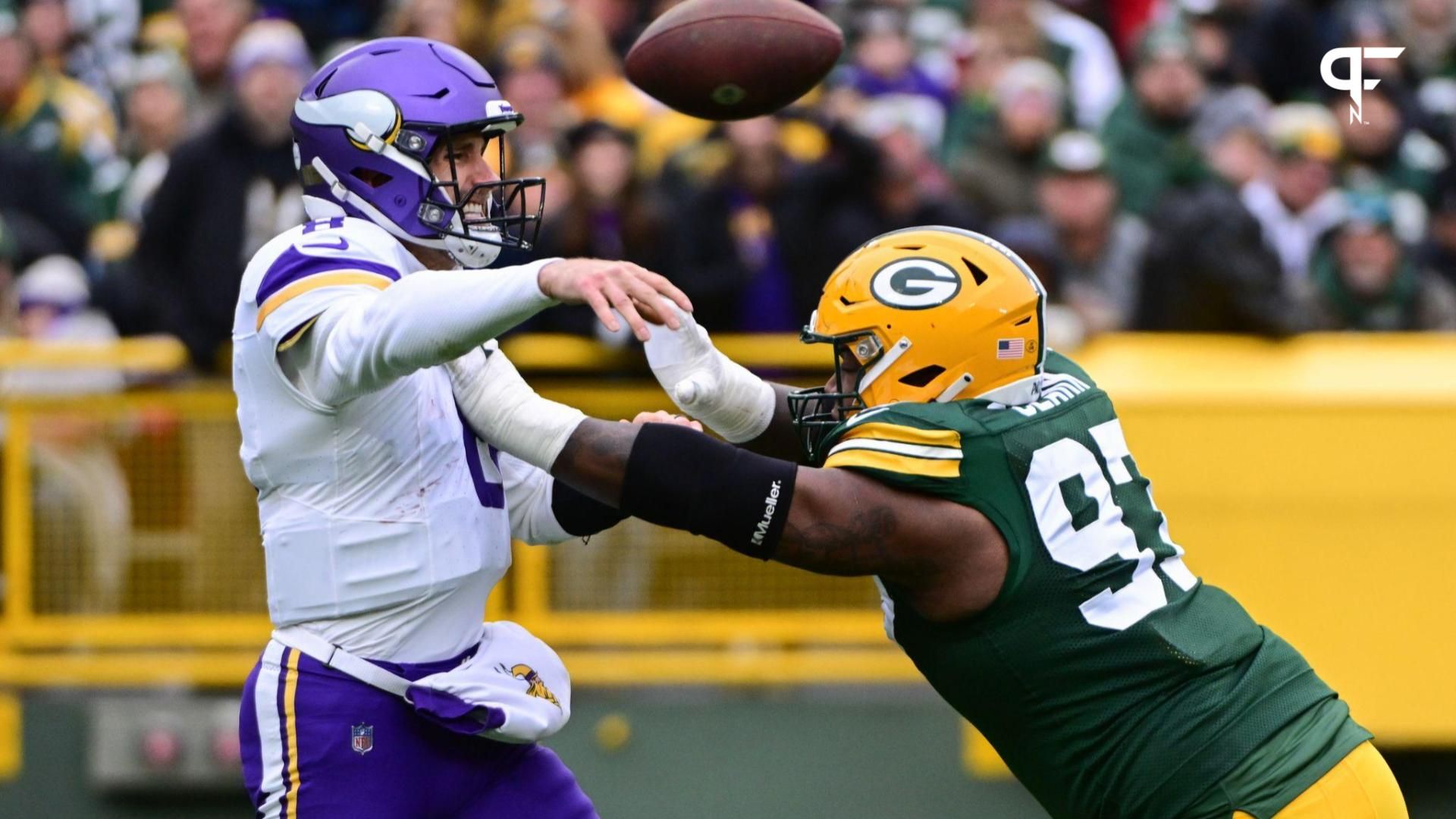 Minnesota Vikings QB Kirk Cousins (8) makes a pass against the Green Bay Packers.