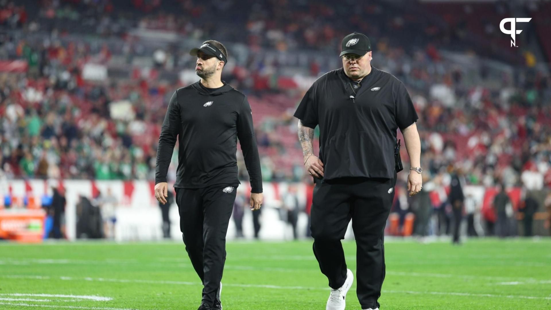 Philadelphia Eagles head coach Nick Sirianni and chief security officer Dom DiSandro walk off the field before a 2024 NFC wild card game against the Tampa Bay Buccaneers during an NFL NFC Wild Card pl...