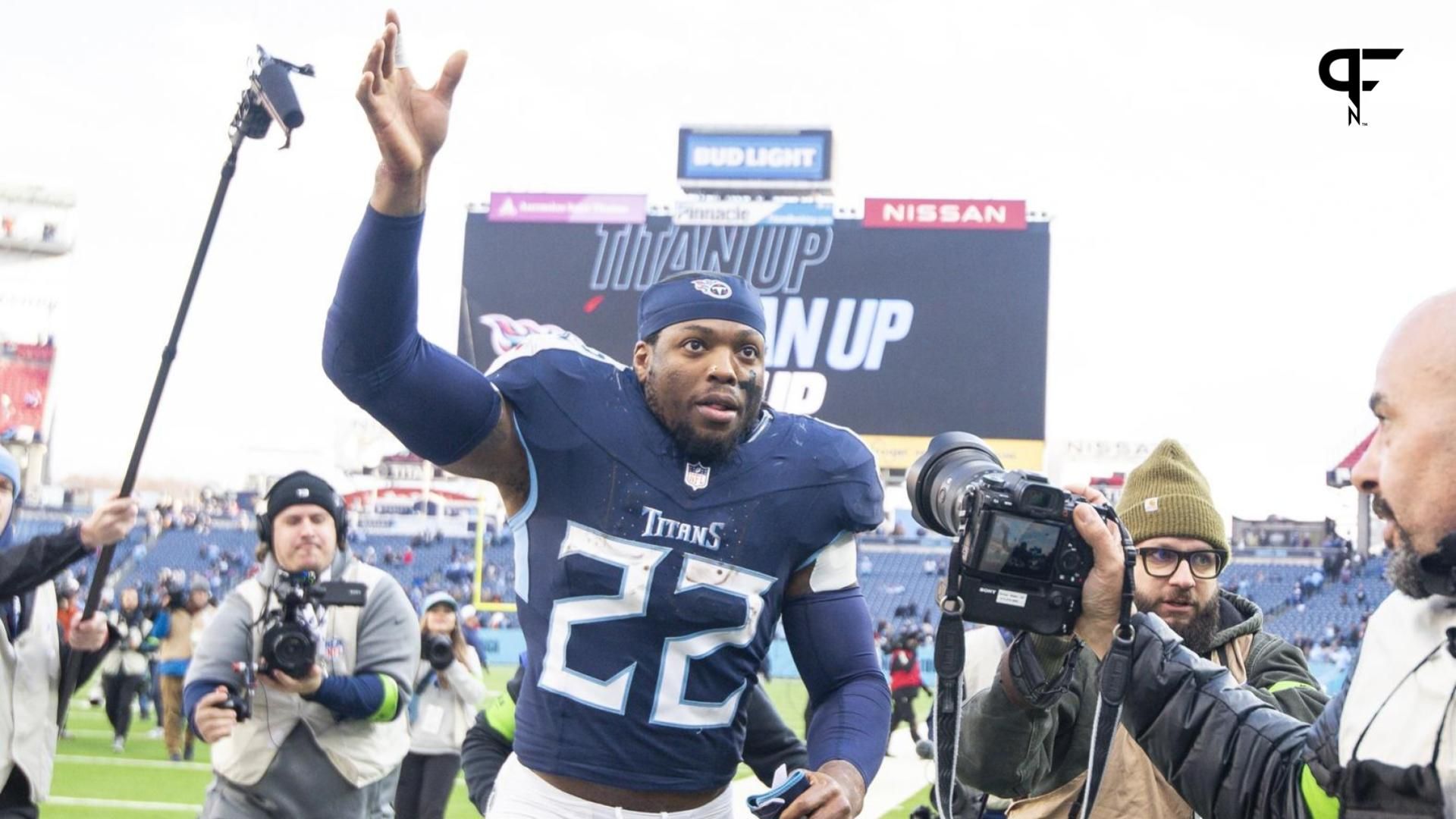 Tennessee Titans running back Derrick Henry (22) waves to the fans as he leaves the field against the Jacksonville Jaguars during the second half at Nissan Stadium.