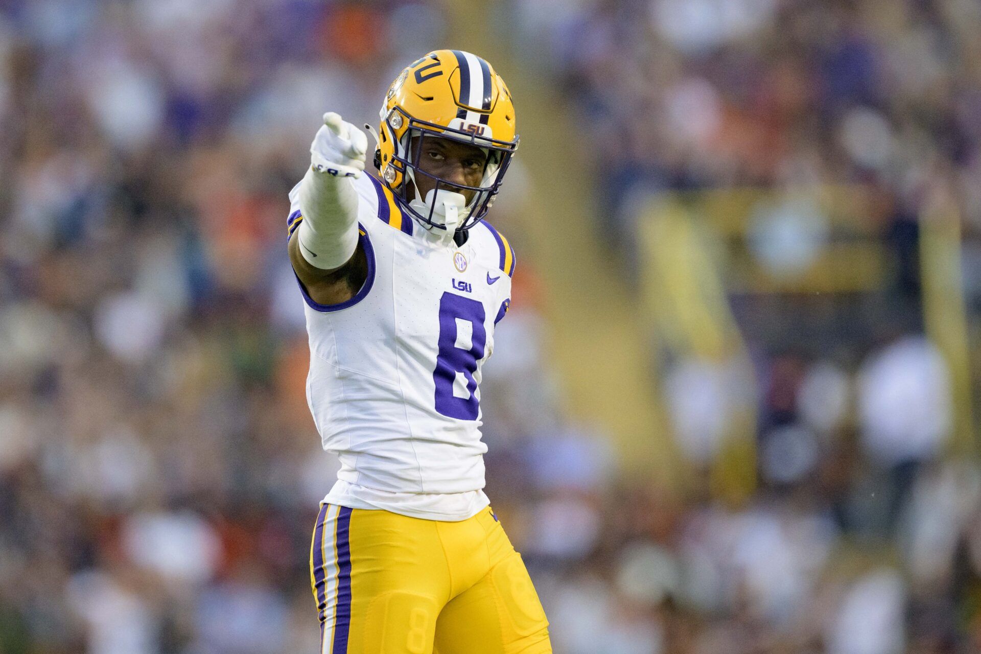 LSU Tigers wide receiver Malik Nabers (8) celebrates a run after a reception against the Auburn Tigers during the first quarter at Tiger Stadium.