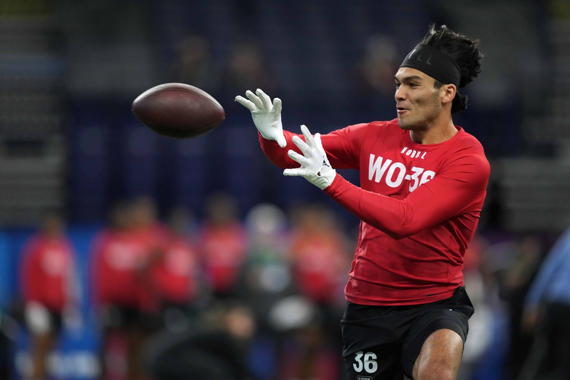 Brigham Young wide receiver Puka Nacua (WO36) participates in drills at Lucas Oil Stadium.