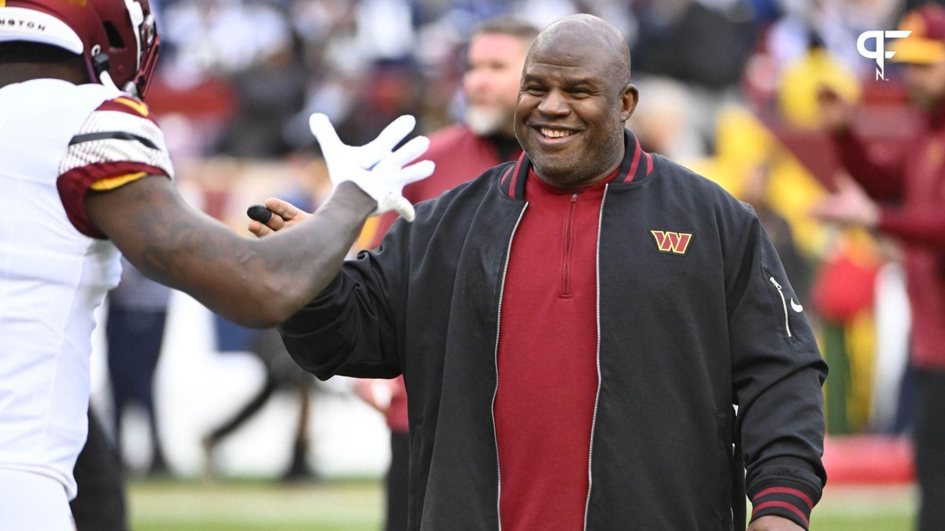 Washington Commanders offensive coordinator Eric Bieniemy on the field before the game against the Dallas Cowboys at FedExField.