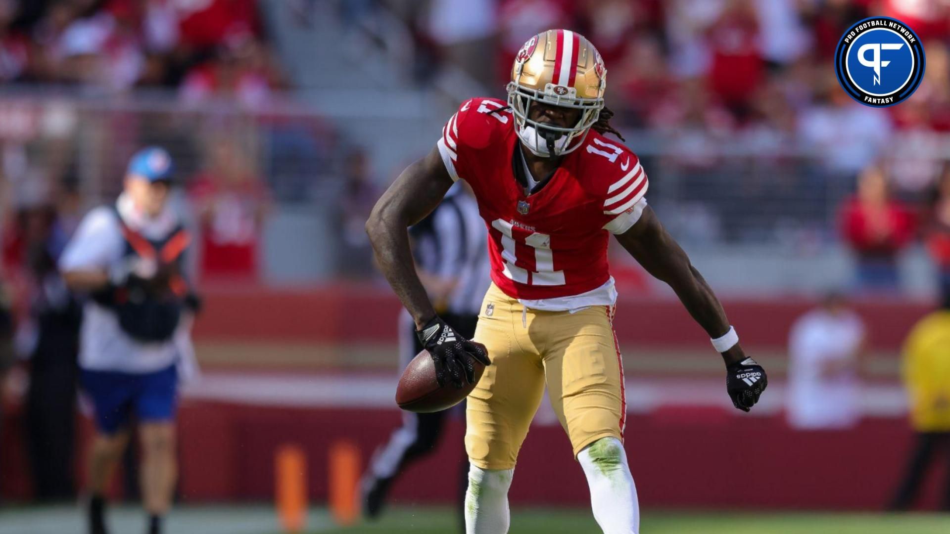 San Francisco 49ers wide receiver Brandon Aiyuk (11) celebrates after a play during the third quarter against the Arizona Cardinals at Levi's Stadium.
