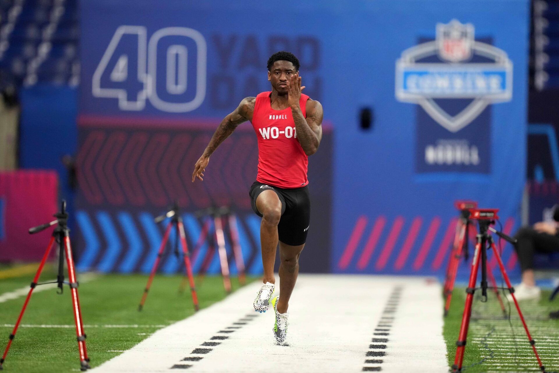 Southern California wide receiver Jordan Addison (WO01) runs in the 40-yard dash during the NFL Scouting Combine at Lucas Oil Stadium.