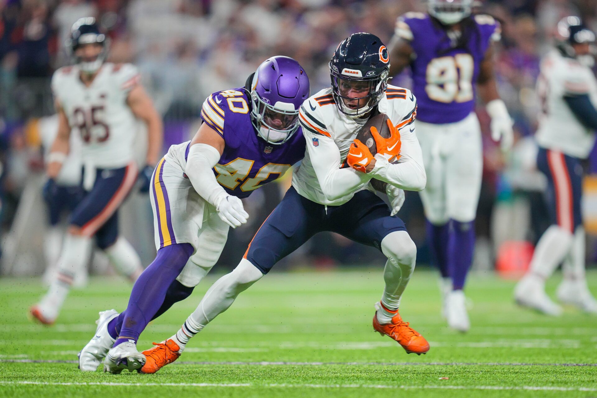 Chicago Bears WR Darnell Mooney (11) runs after the catch against the Minnesota Vikings.