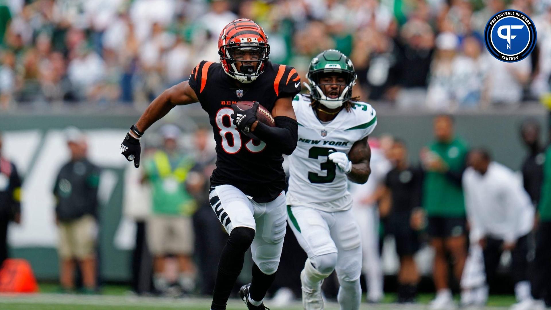 Cincinnati Bengals wide receiver Tyler Boyd (83) catches a pass on a crossing play on his way to a touchdown in the first quarter of the NFL Week 3 game between the New York Jets and the Cincinnati Bengals at MetLife Stadium in East Rutherford, N.J., on Sunday, Sept. 25, 2022.