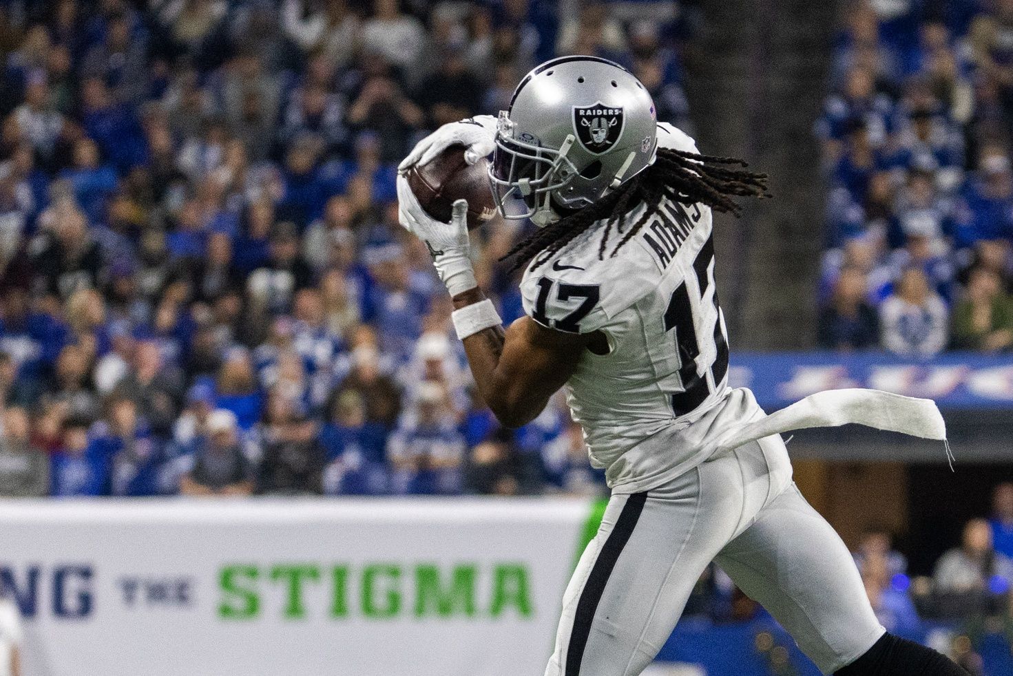 Las Vegas Raiders wide receiver Davante Adams (17) catches a ball in the second half against the Indianapolis Colts at Lucas Oil Stadium.