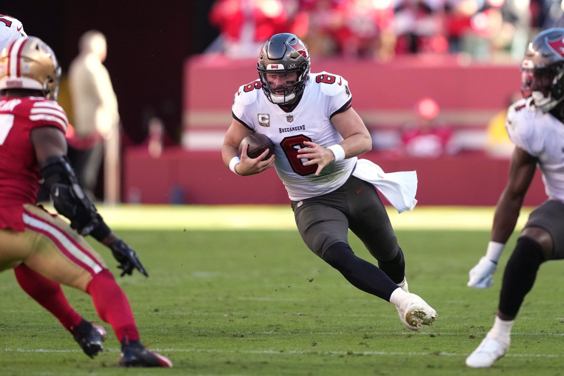 Tampa Bay Buccaneers QB Baker Mayfield (6) runs with the ball against the San Francisco 49ers.