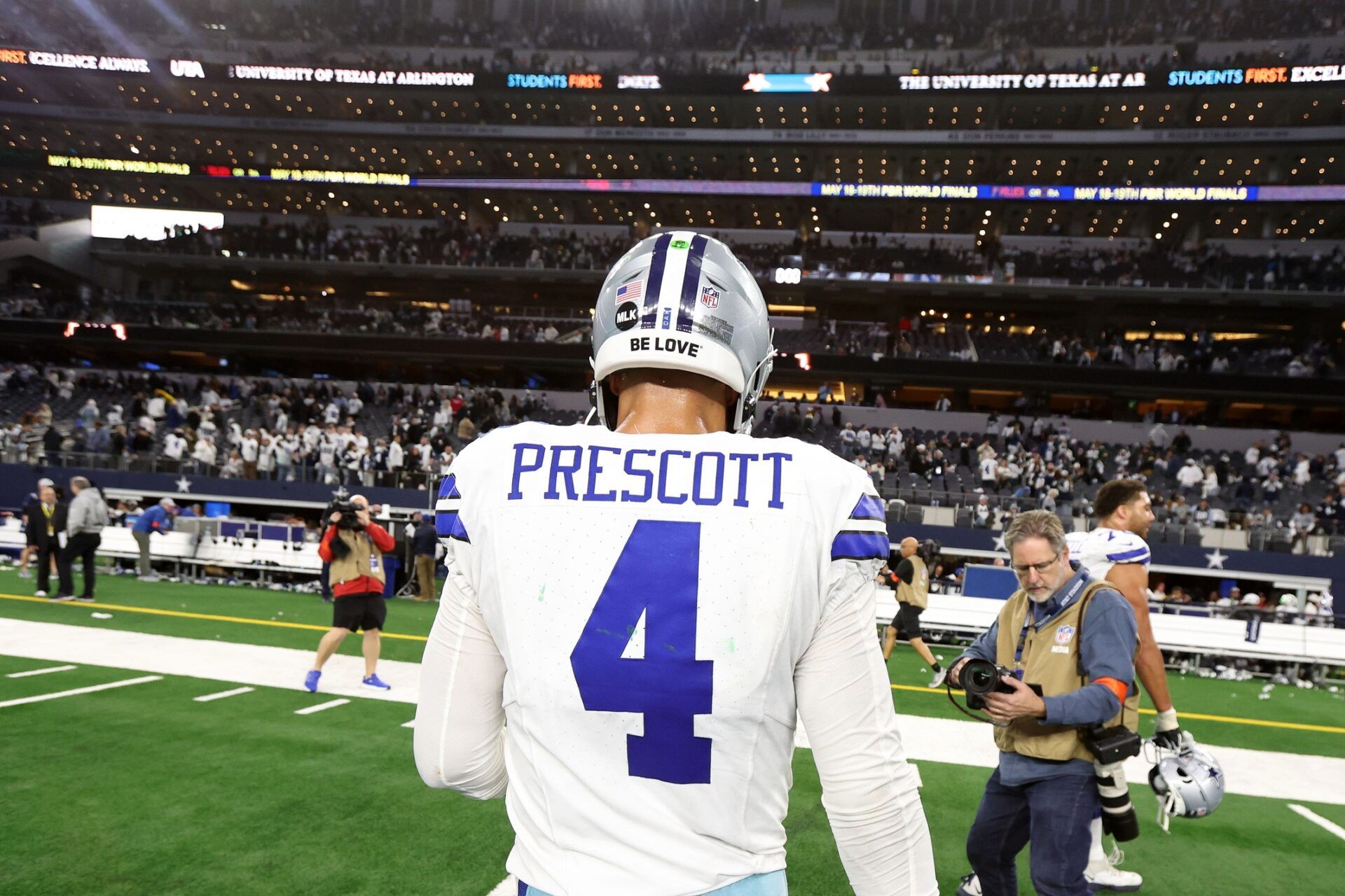 Dallas Cowboys quarterback Dak Prescott (4) walks off the field after losing in the 2024 NFC wild card game against the Green Bay Packers at AT&T Stadium.