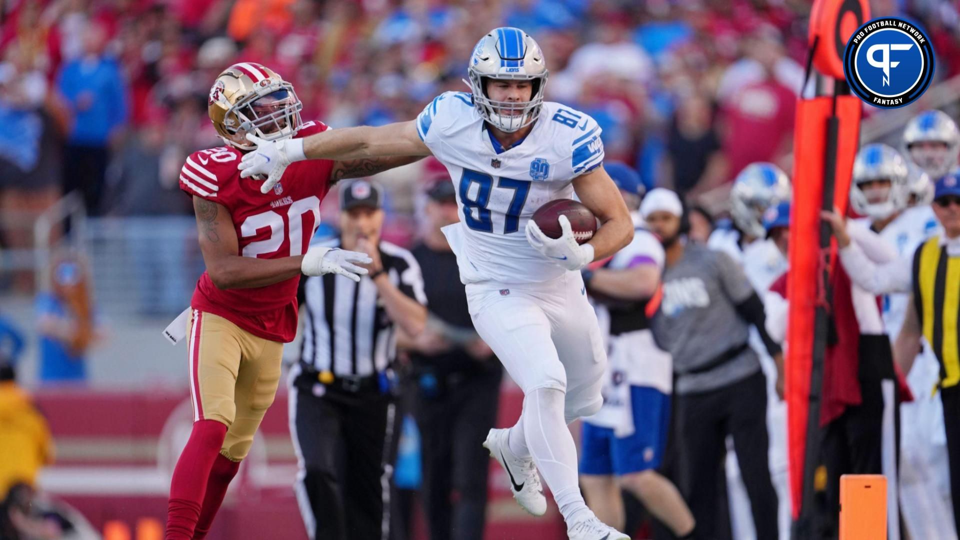 Detroit Lions tight end Sam LaPorta (87) runs with the ball against San Francisco 49ers cornerback Ambry Thomas (20) during the first half of the NFC Championship football game at Levi's Stadium.