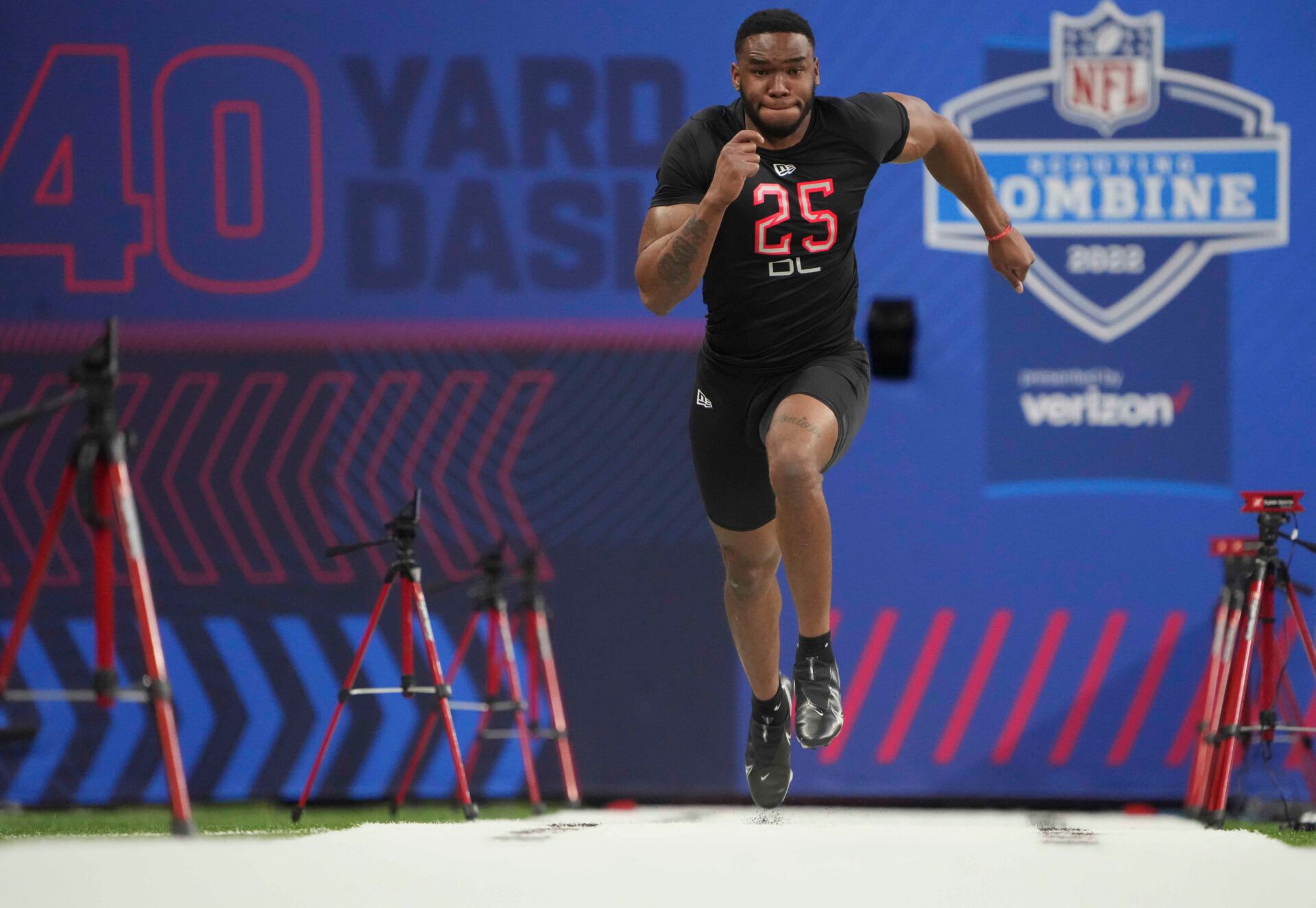 Virginia Tech defensive lineman Amare Barno (DL25) runs the 40-yard dash during the 2022 NFL Scouting Combine at Lucas Oil Stadium.