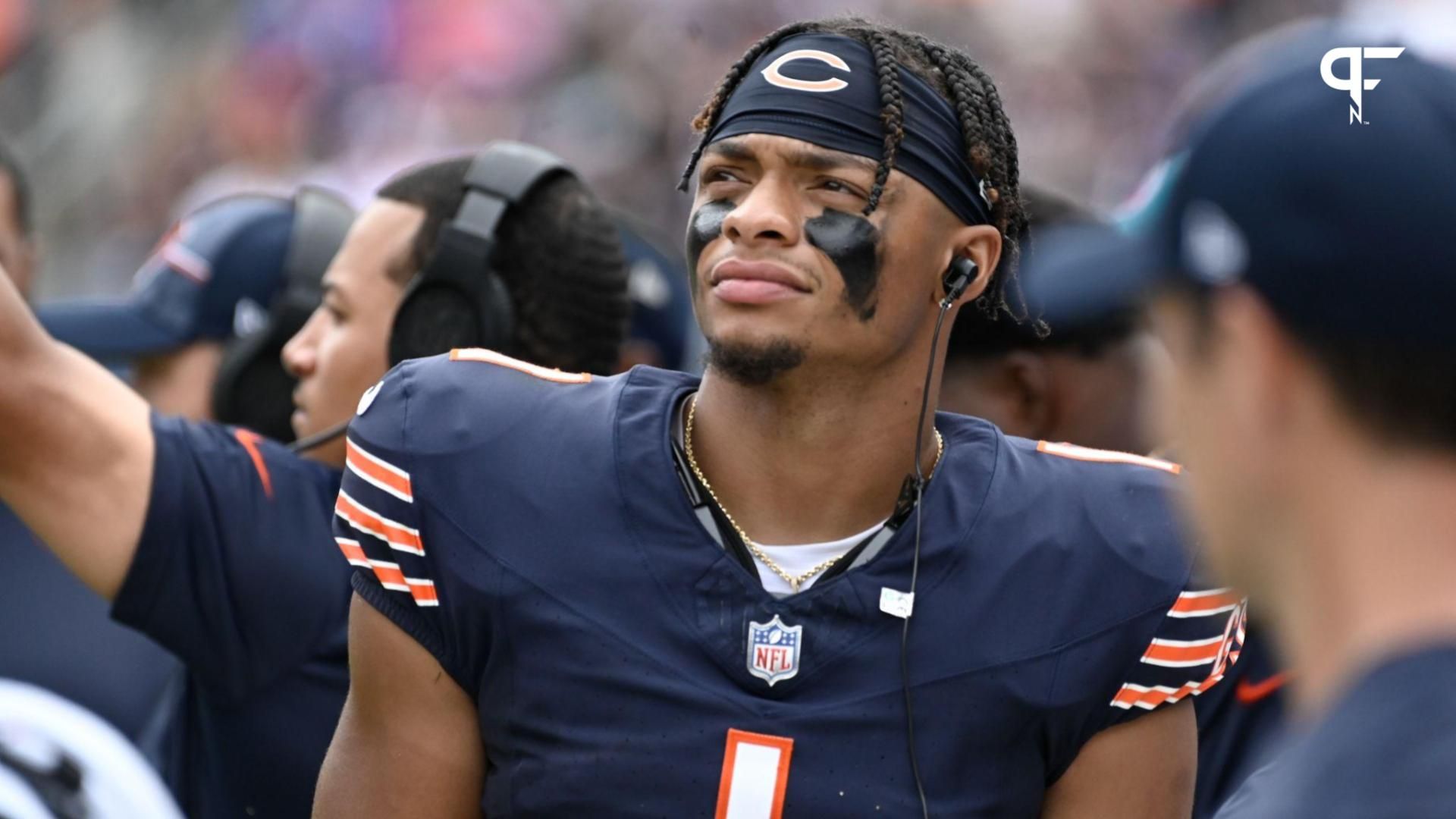 Chicago Bears quarterback Justin Fields (1) looks on from the sidelines during the first half against the Buffalo Bills at Soldier Field.