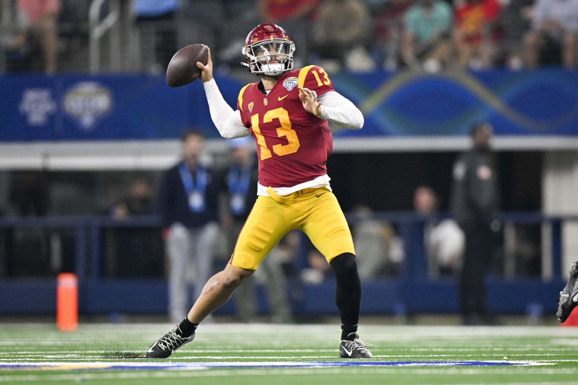 USC Trojans QB Caleb Williams (13) throws a pass against the Tulane Green Wave.