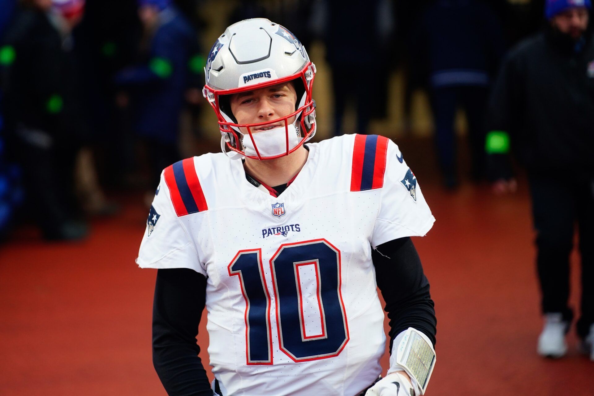 New England Patriots quarterback Mac Jones (10) walks out to the field prior to the game against the Buffalo Bills at Highmark Stadium.