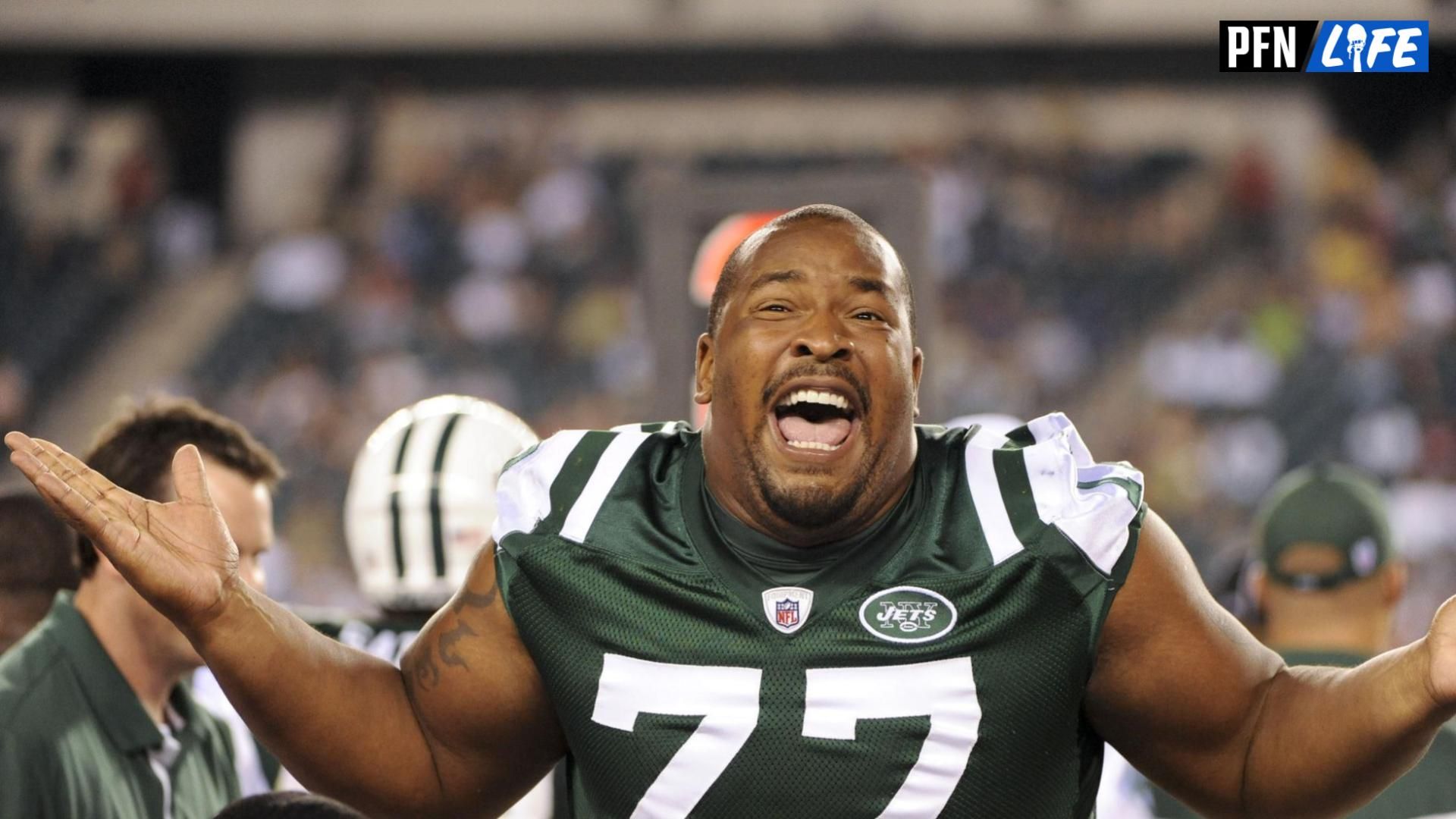 New York Jets defensive tackle Kris Jenkins (77) interacts with Philadelphia Eagles fans during the fourth quarter at Lincoln Financial Field. The Jest defeated the Eagles 21-17.