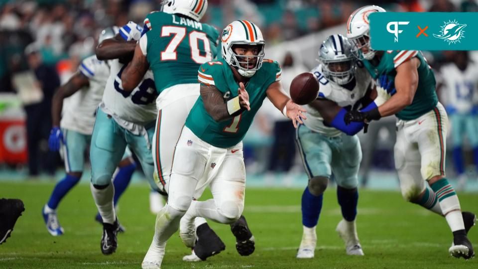 Miami Dolphins quarterback Tua Tagovailoa (1) pitches the ball against the Dallas Cowboys during the second half at Hard Rock Stadium.