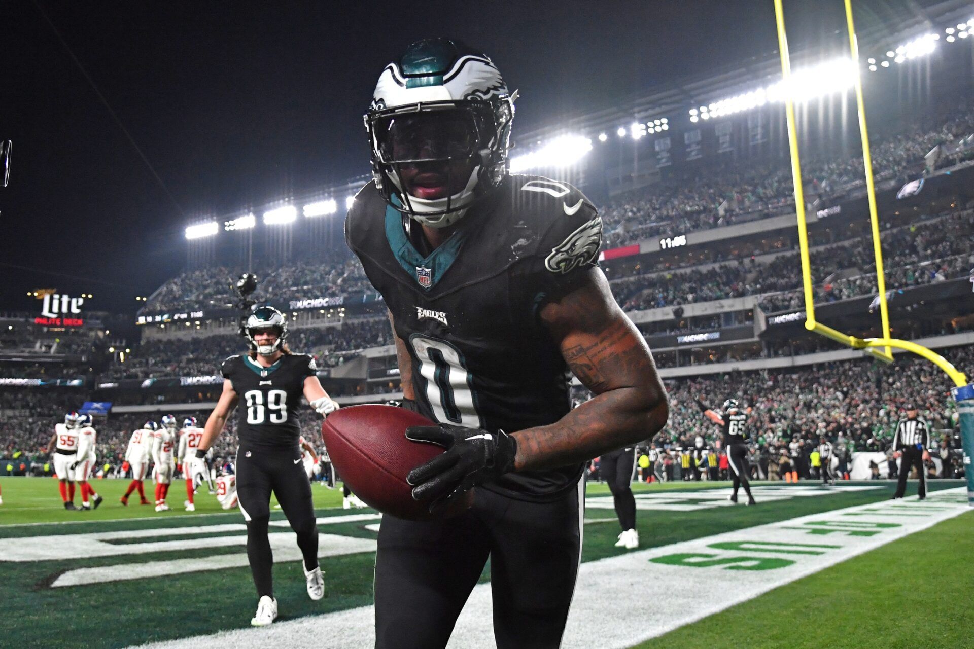 Philadelphia Eagles running back D'Andre Swift (0) celebrates his touchdown against the New York Giants at Lincoln Financial Field.