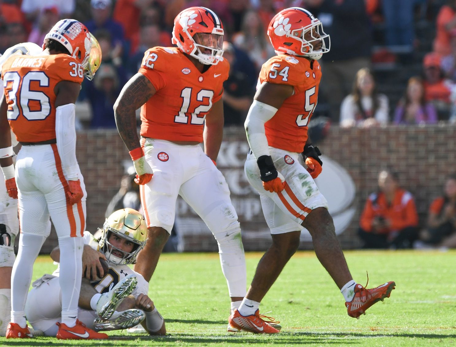 Clemson Tigers linebacker Jeremiah Trotter Jr. (54) reacts after sacking Notre Dame Fighting Irish quarterback Sam Hartman (10) during the fourth quarter at Memorial Stadium.