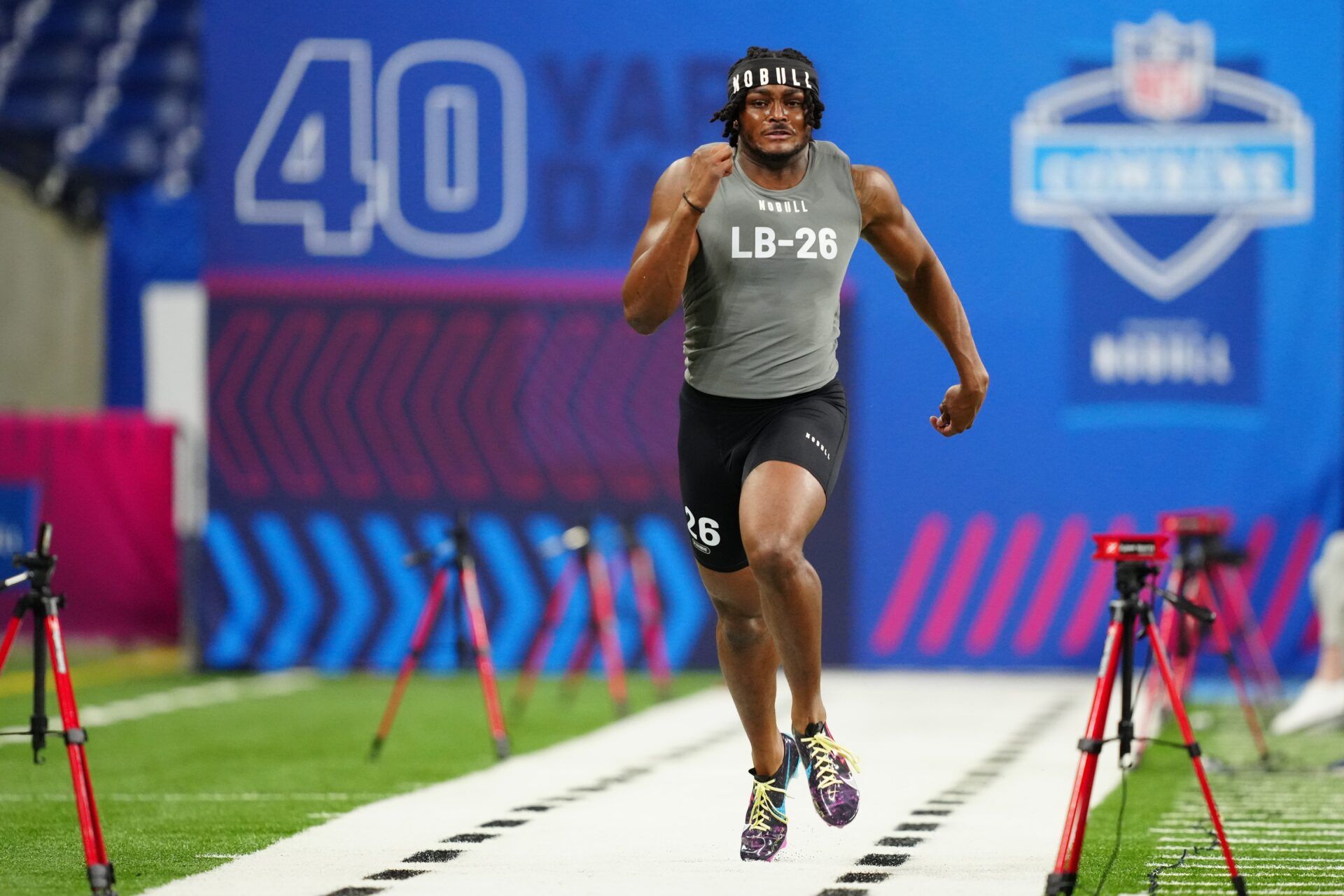 Alabama linebacker Dallas Turner (LB26) works out during the 2024 NFL Combine at Lucas Oil Stadium.