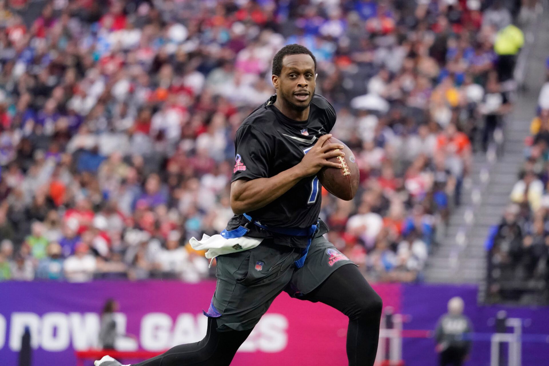 NFC quarterback Geno Smith of the Seattle Seahawks (7) runs the ball during the second half against the AFC during the 2023 Pro Bowl at Allegiant Stadium.