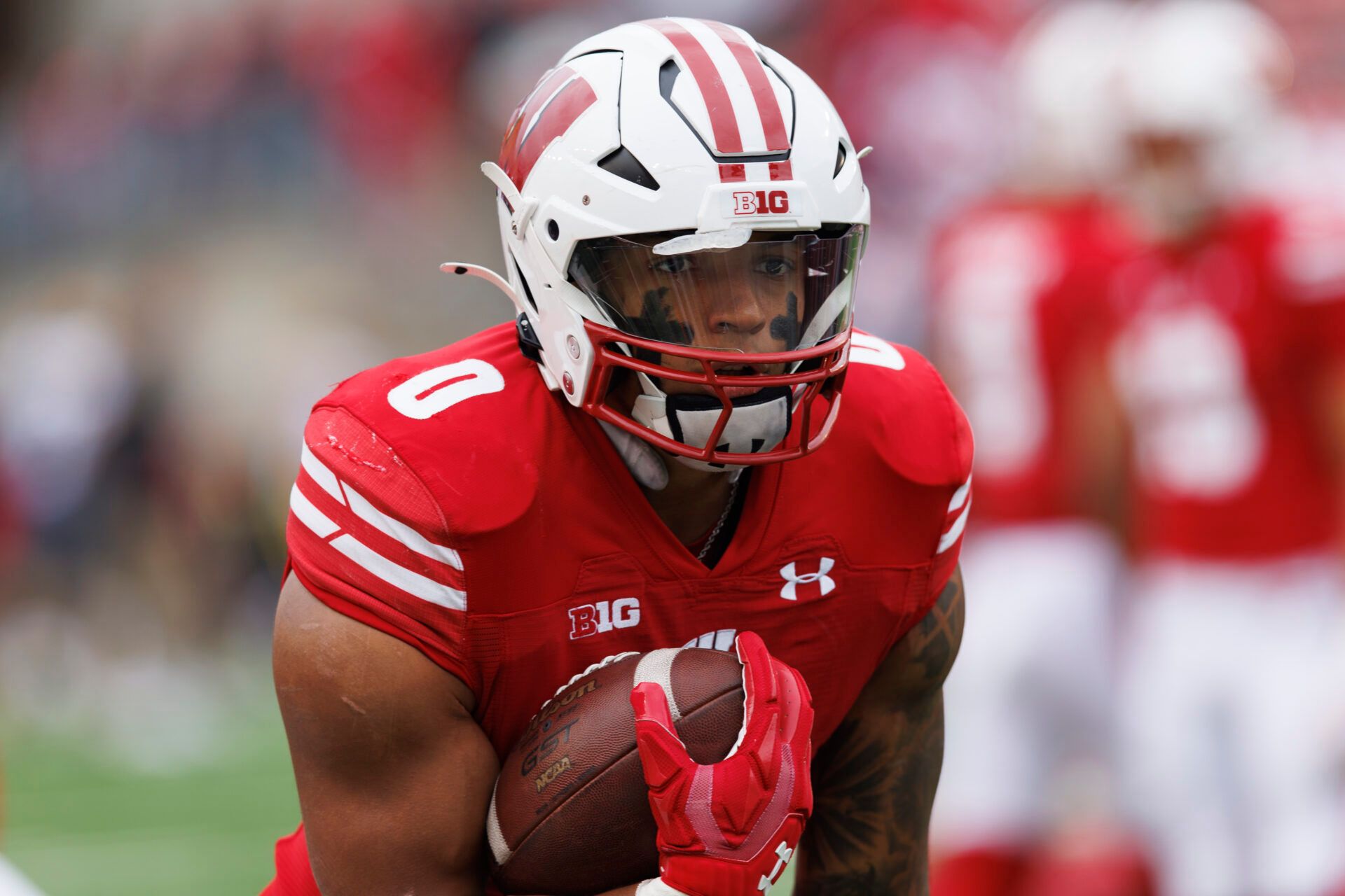 Wisconsin Badgers running back Braelon Allen (0) during warmups prior to the game against the Iowa Hawkeyes at Camp Randall Stadium.