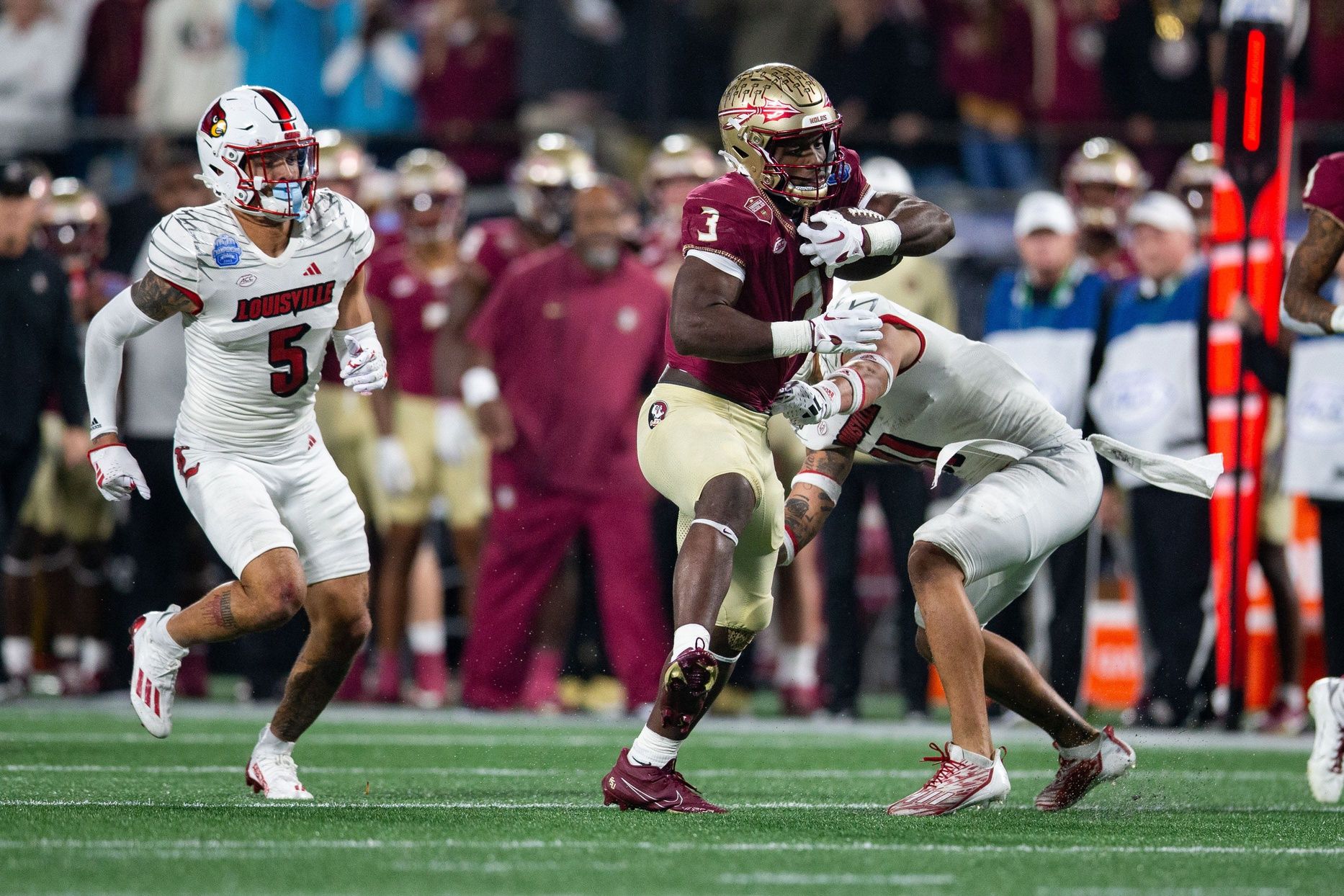 Florida State Seminoles running back Trey Benson (3) makes his way down the field. The Florida State Seminoles defeated the Louisville Cardinals 16-6 to claim the ACC Championship title in Charlotte, North Carolina on Saturday, Dec. 2, 2023.