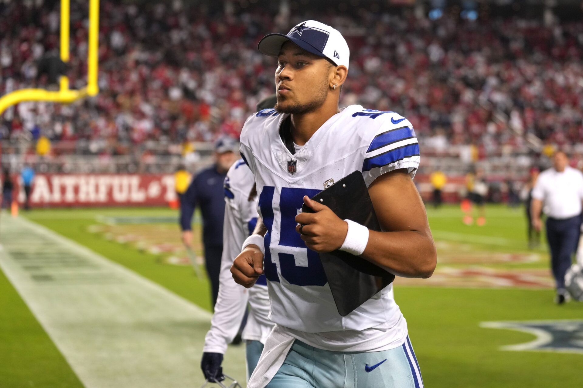 Dallas Cowboys quarterback Trey Lance (15) jogs off of the field during halftime against the San Francisco 49ers at Levi's Stadium.