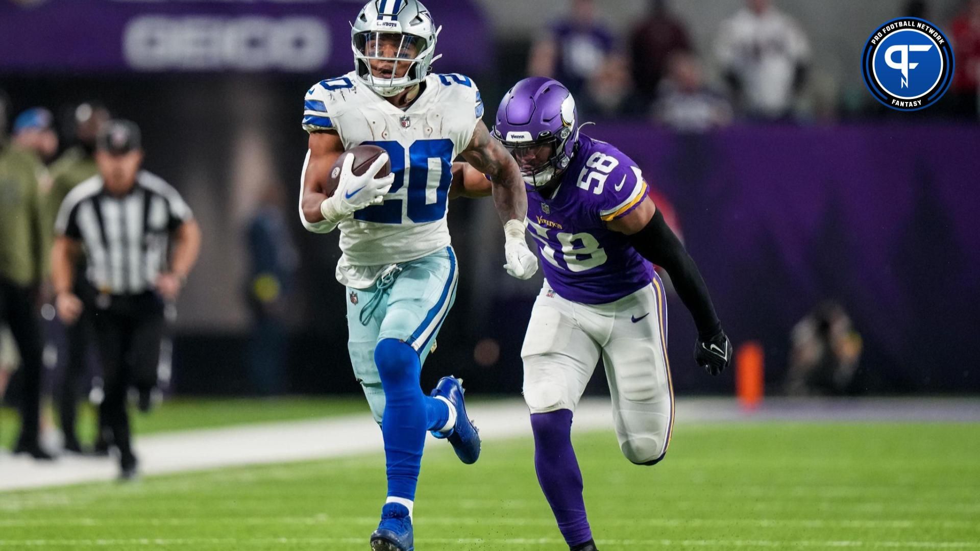 Dallas Cowboys RB Tony Pollard (20) rushes the ball against the Minnesota Vikings.