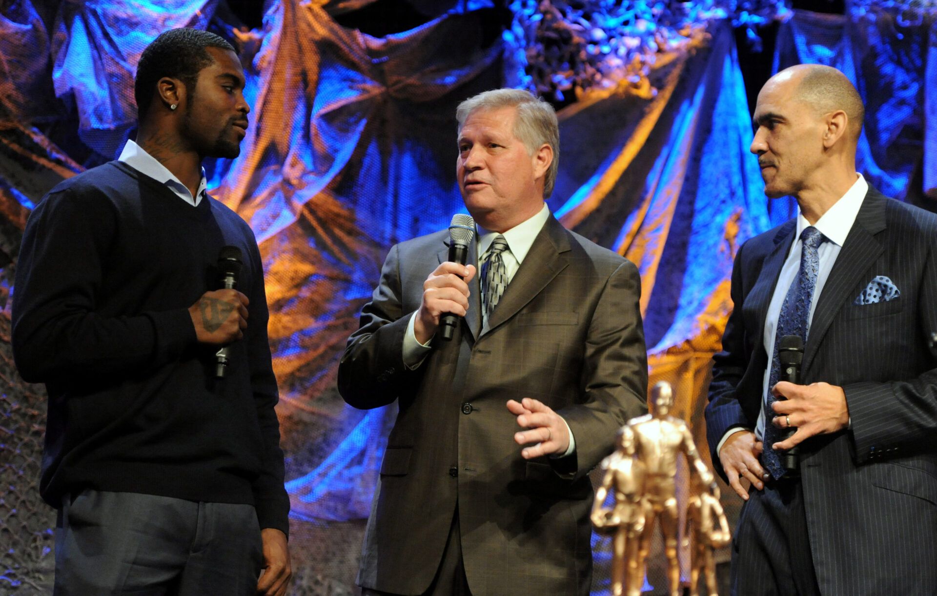 Chris Mortensen (center) interviews Michael Vick (left) and Tony Dungy at the Super Bowl Breakfast at the Westin Diplomat Resort & Spa.