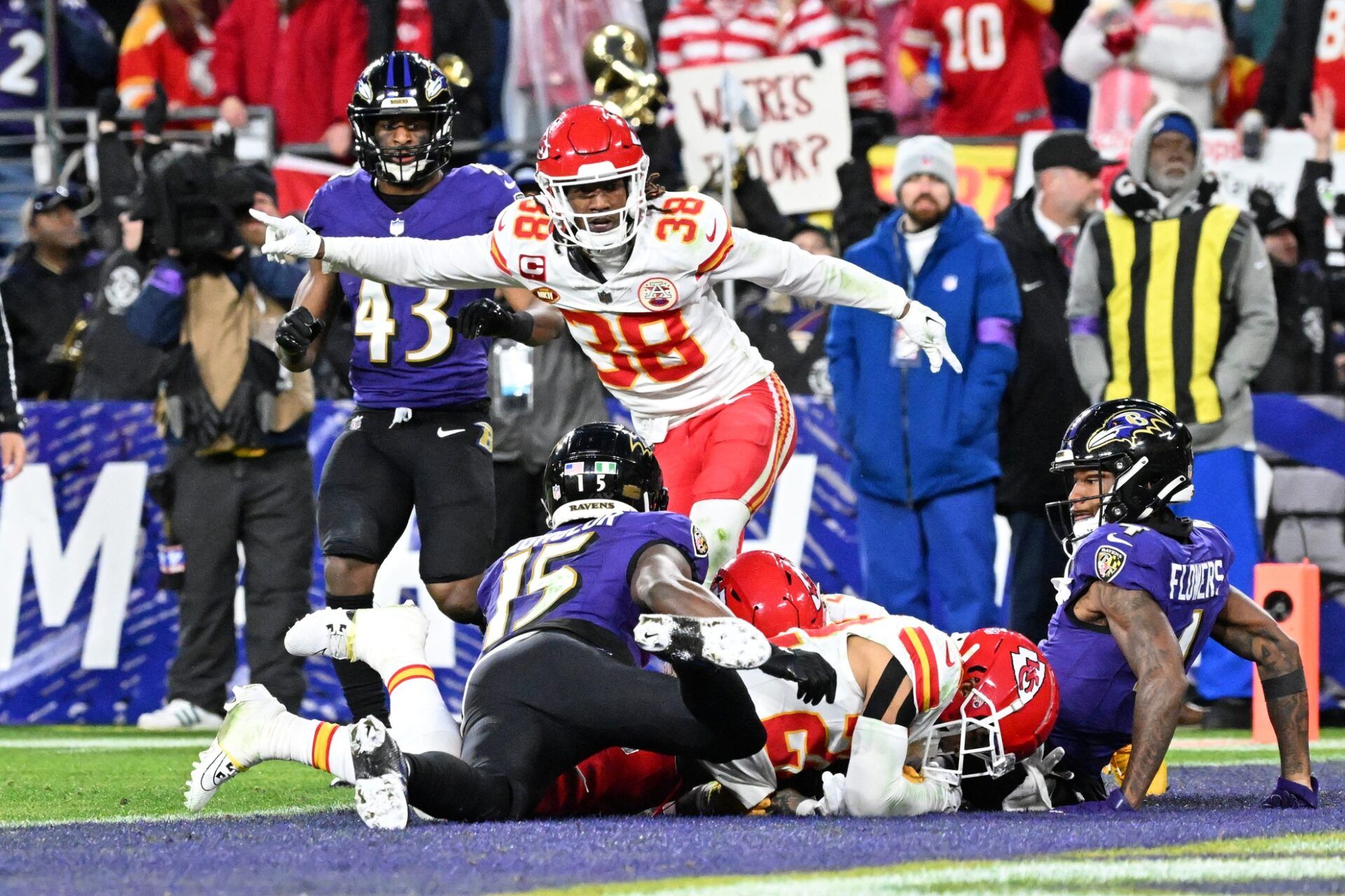 Kansas City Chiefs cornerback L'Jarius Sneed (38) celebrates as cornerback Trent McDuffie (22) recovers a fumble against Baltimore Ravens wide receiver Zay Flowers (4) and wide receiver Nelson Agholor (15) for a turnover during the second half in the AFC Championship football game at M&T Bank Stadium.