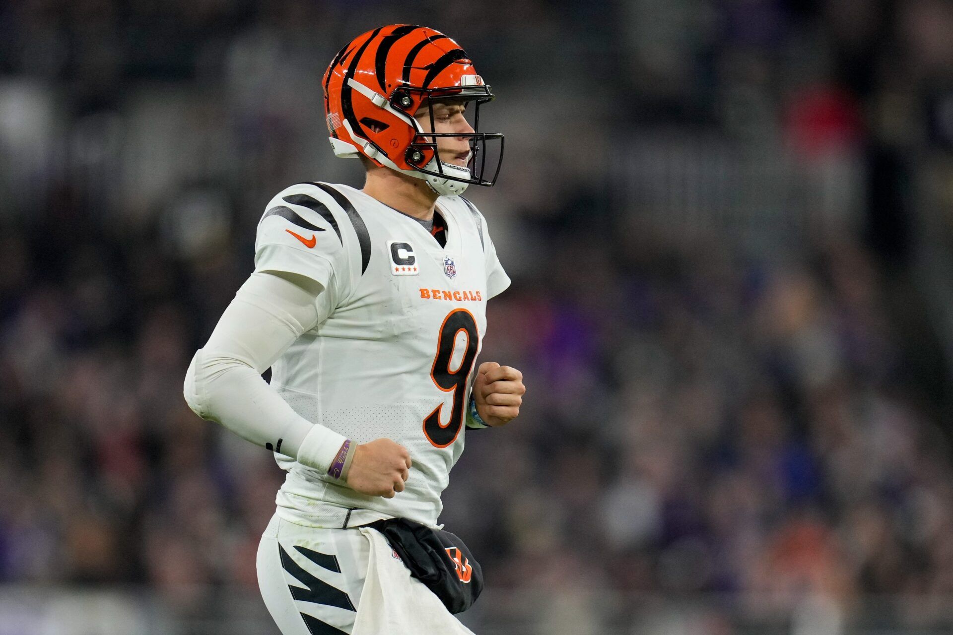 Cincinnati Bengals quarterback Joe Burrow (9) runs on the field at the Bengals offense takes over in the second quarter of the NFL Week 11 game between the Baltimore Ravens and the Cincinnati Bengals at M&T Bank Stadium in Baltimore on Thursday, Nov. 16, 2023.