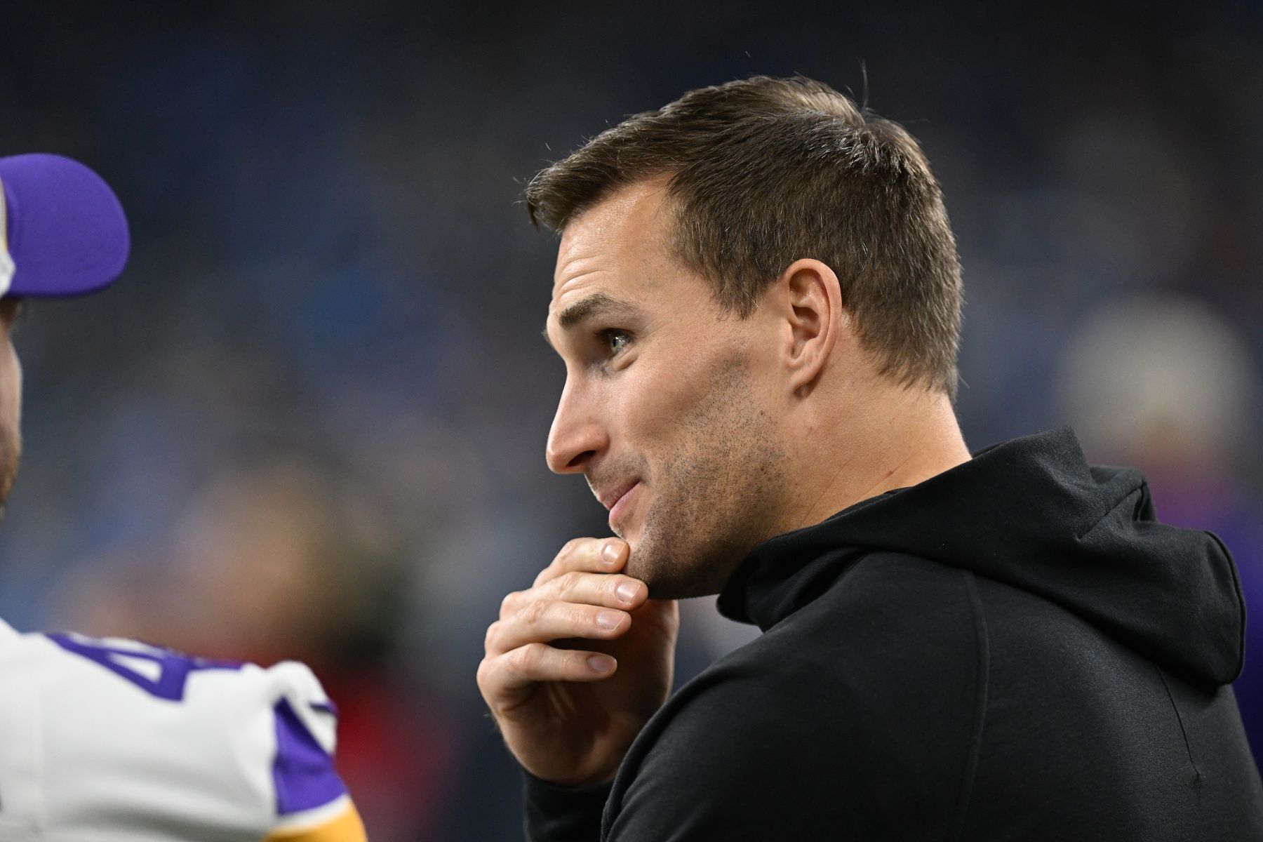 Minnesota Vikings QB Kirk Cousins (8) talks with teammates prior to their game against the Detroit Lions at Ford Field.