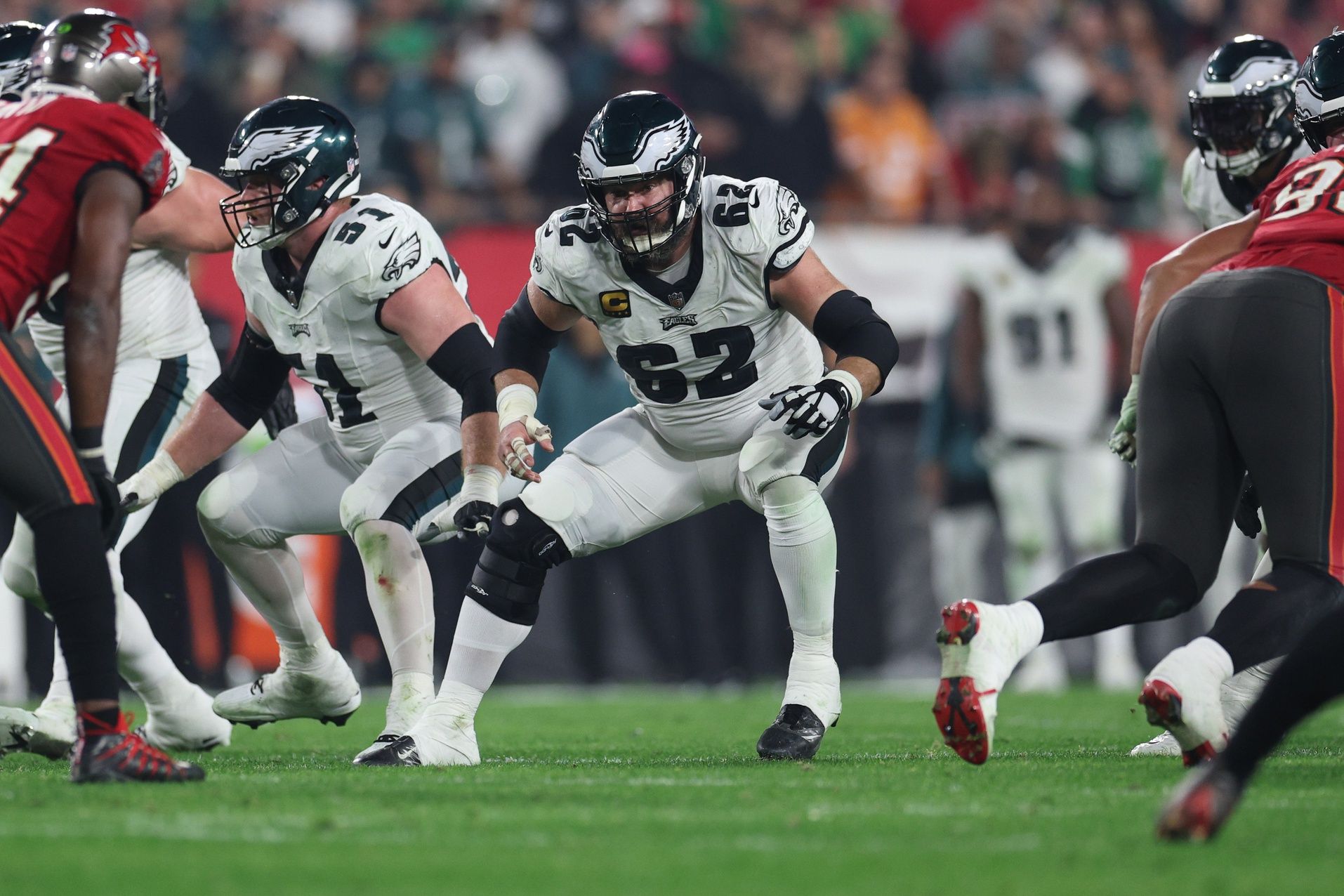 Philadelphia Eagles center Jason Kelce (62) blocks against the Tampa Bay Buccaneers during the second half of a 2024 NFC wild card game at Raymond James Stadium.