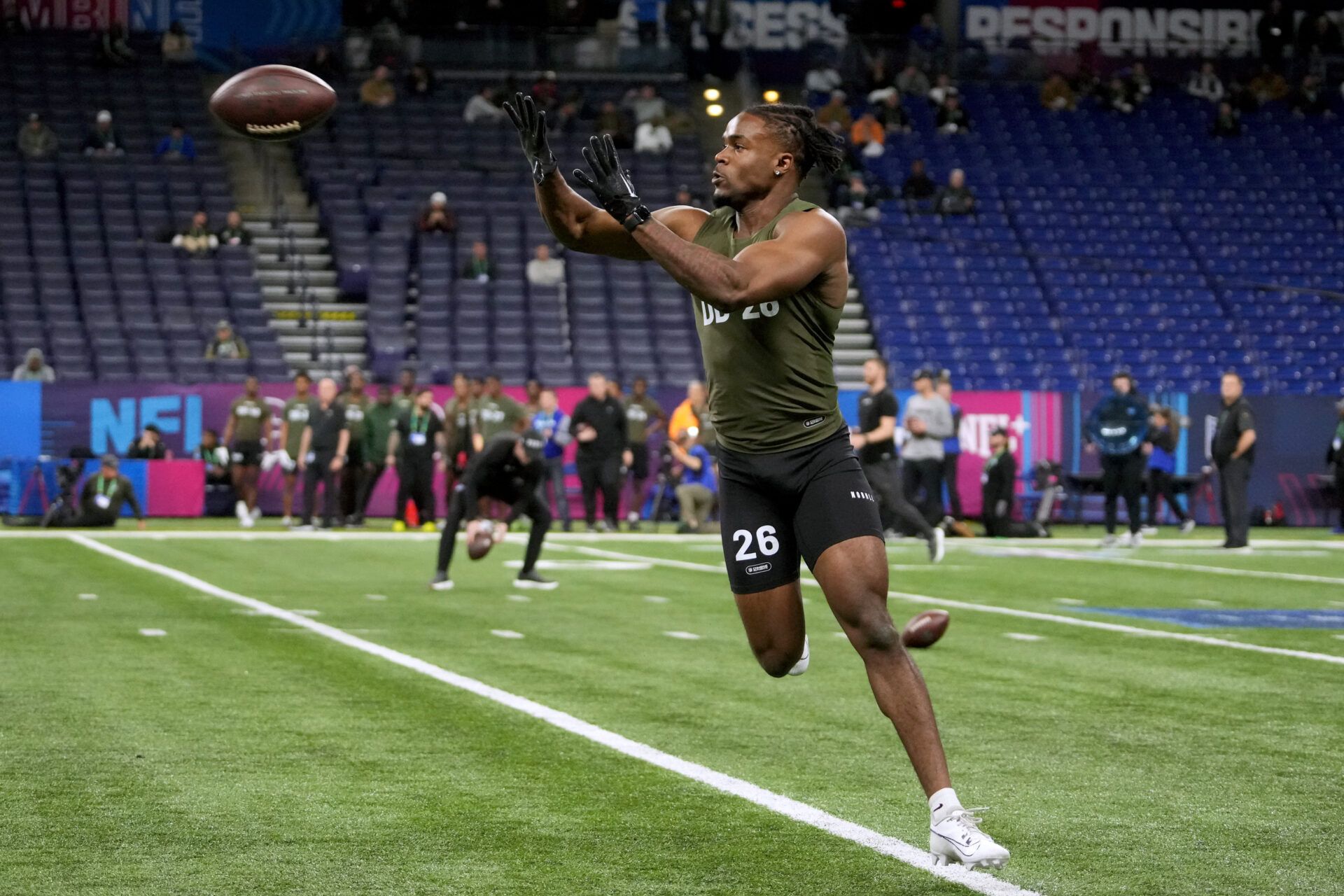 Rutgers defensive back Max Melton (DB26) works out during the 2024 NFL Combine at Lucas Oil Stadium.