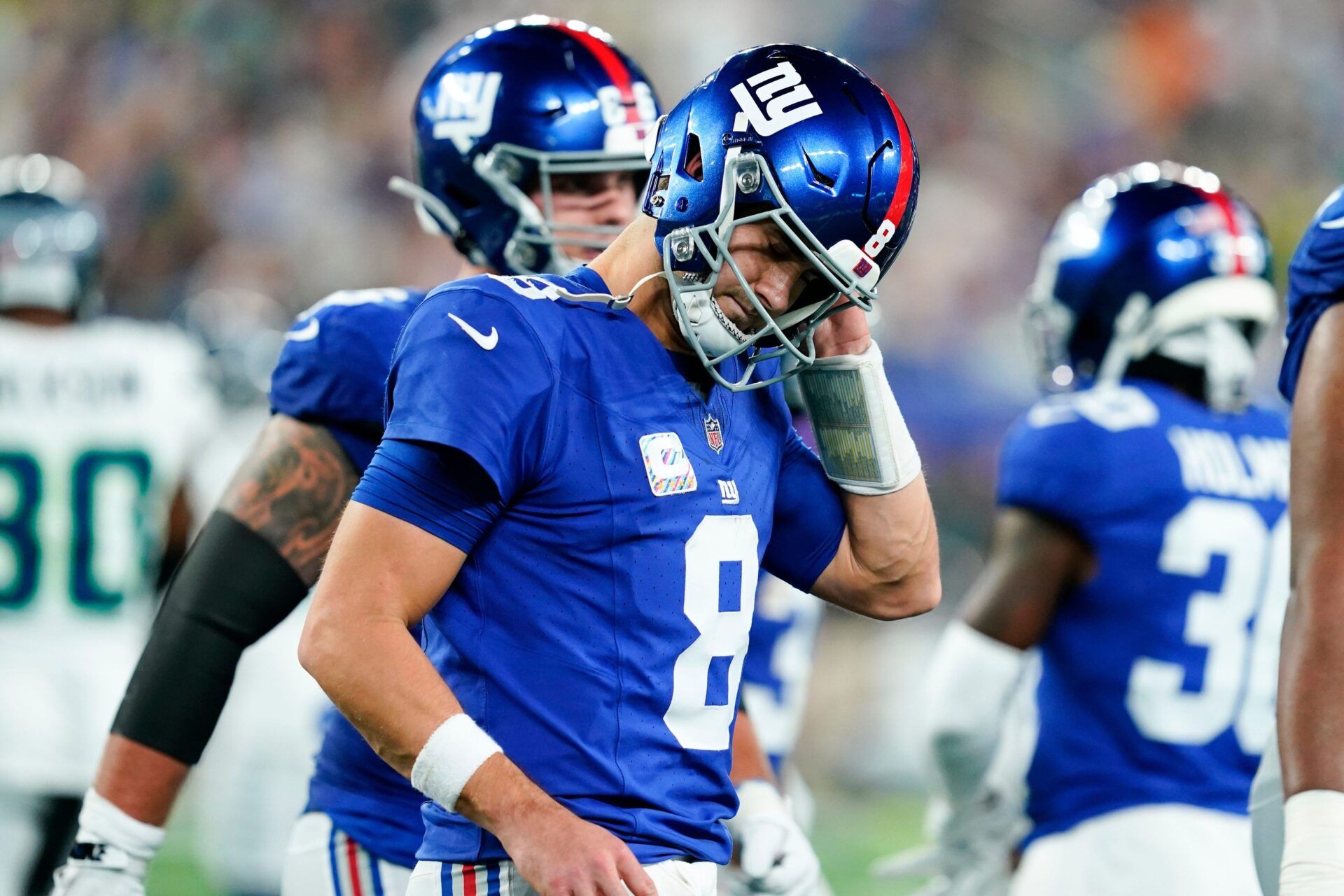 New York Giants quarterback Daniel Jones (8) walks off the field after failing to convert on downs in the first half against the Seattle Seahawks at MetLife Stadium on Monday, Oct. 2, 2023, in East Rutherford.