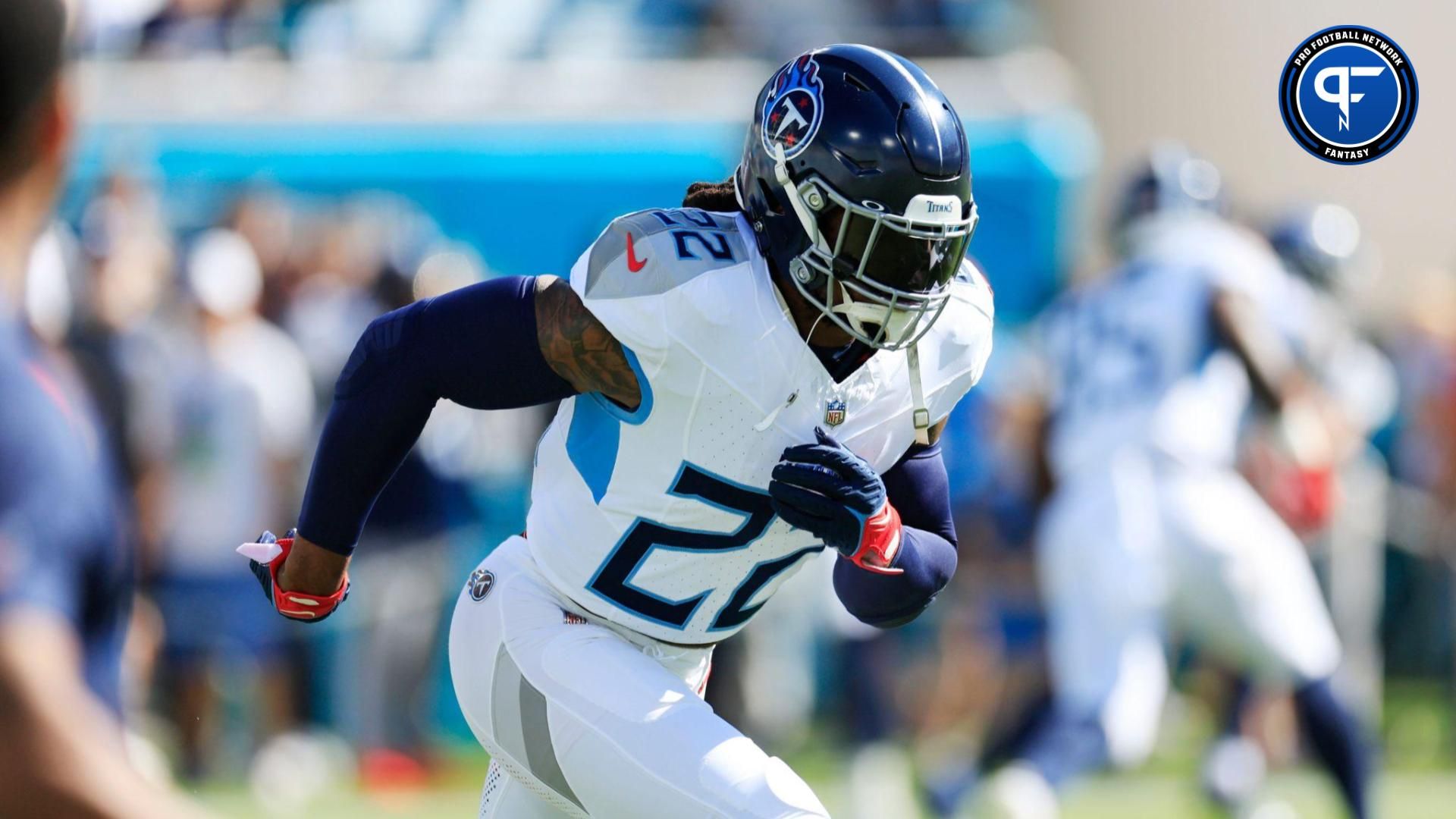 Tennessee Titans running back Derrick Henry (22) warms up before an NFL football matchup Sunday, Nov. 19, 2023 at EverBank Stadium in Jacksonville, Fla.