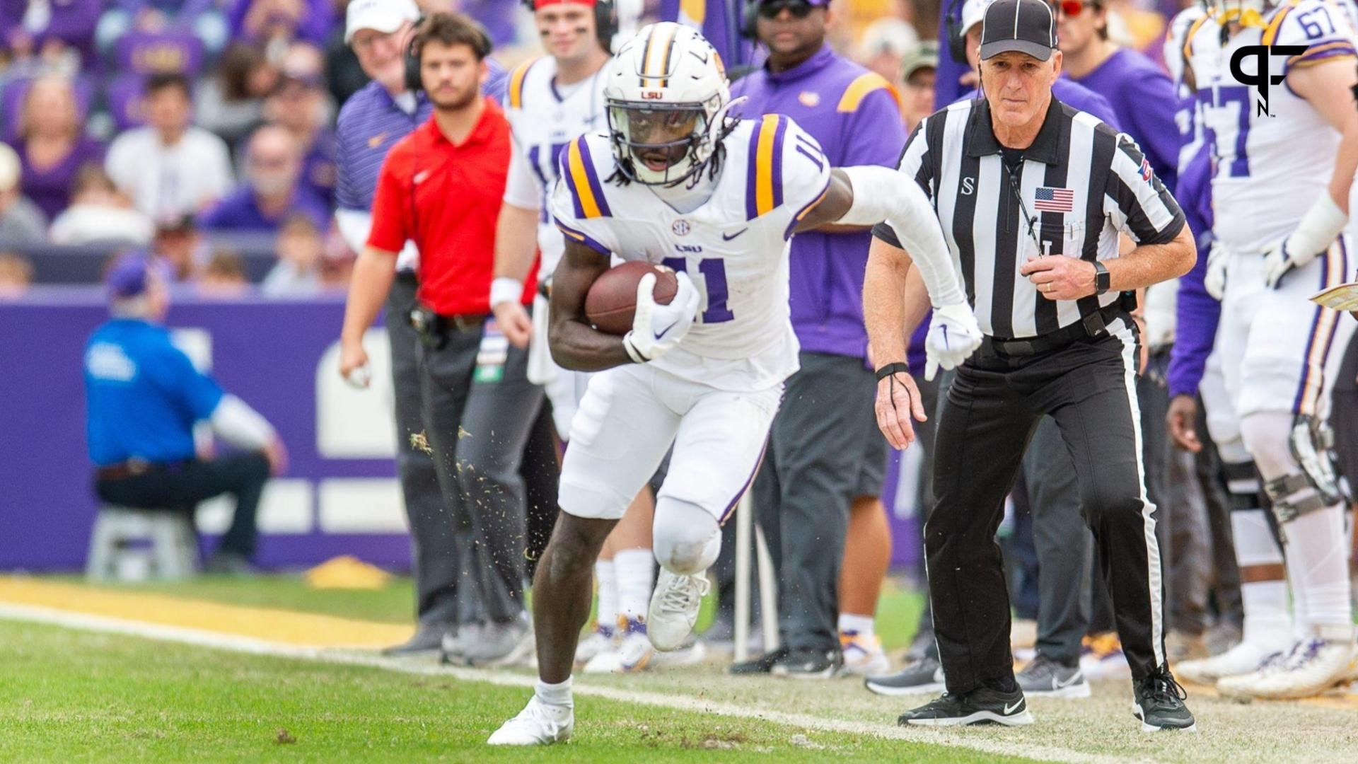 Brian Thomas Jr 11 runs the ball as the LSU Tigers take on Texas A&M in Tiger Stadium in Baton Rouge, Louisiana, November 25, 2023.