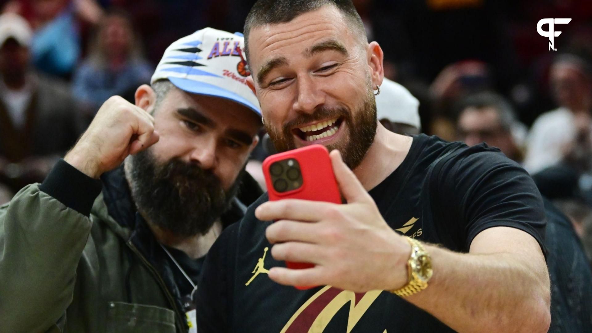 Cleveland natives and NFL players Travis, right, and Jason Kelce celebrate after the Cleveland Cavaliers beat the Boston Celtics during the second half at Rocket Mortgage FieldHouse.