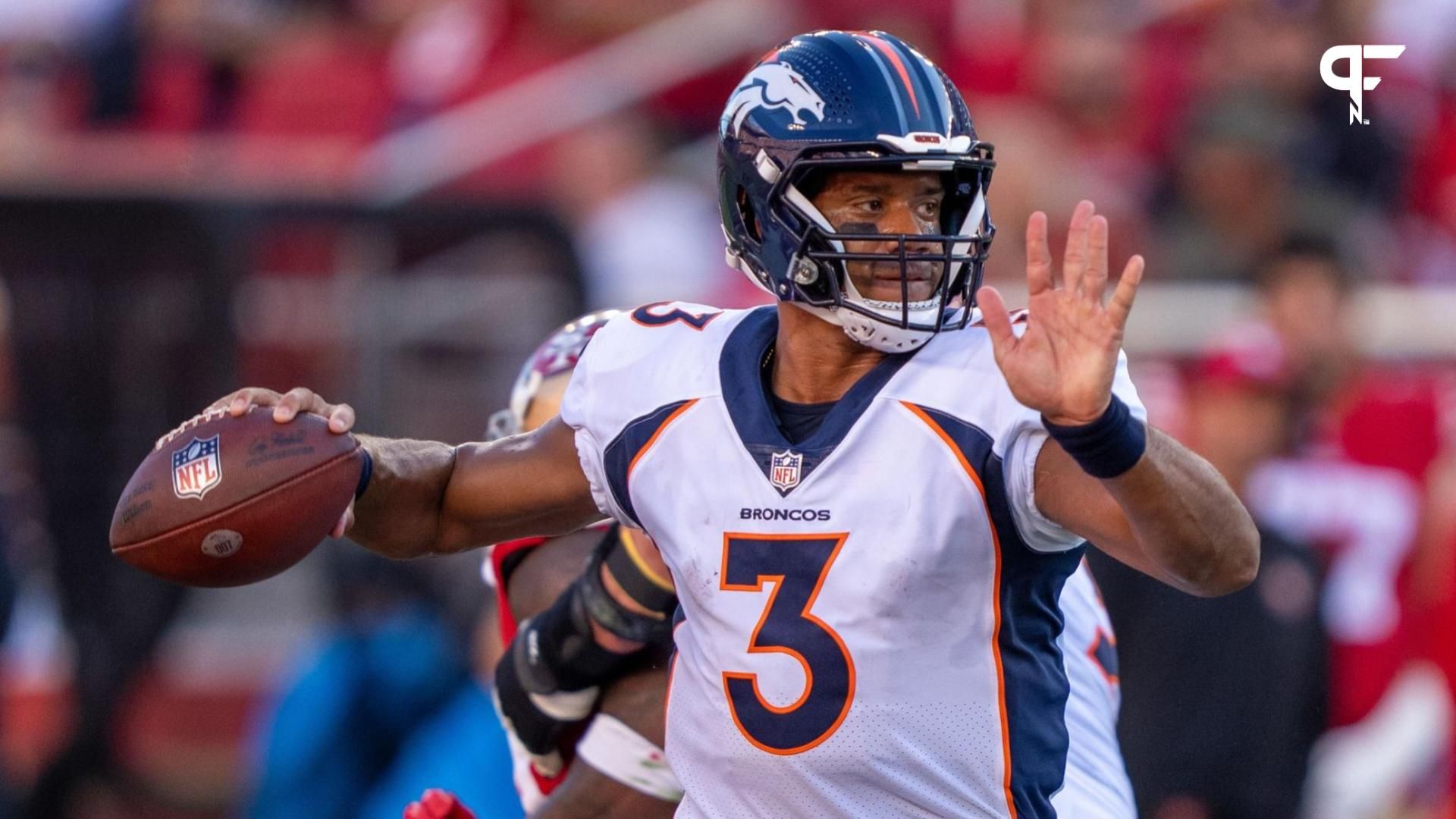 Denver Broncos QB Russell Wilson (3) drops back to pass.